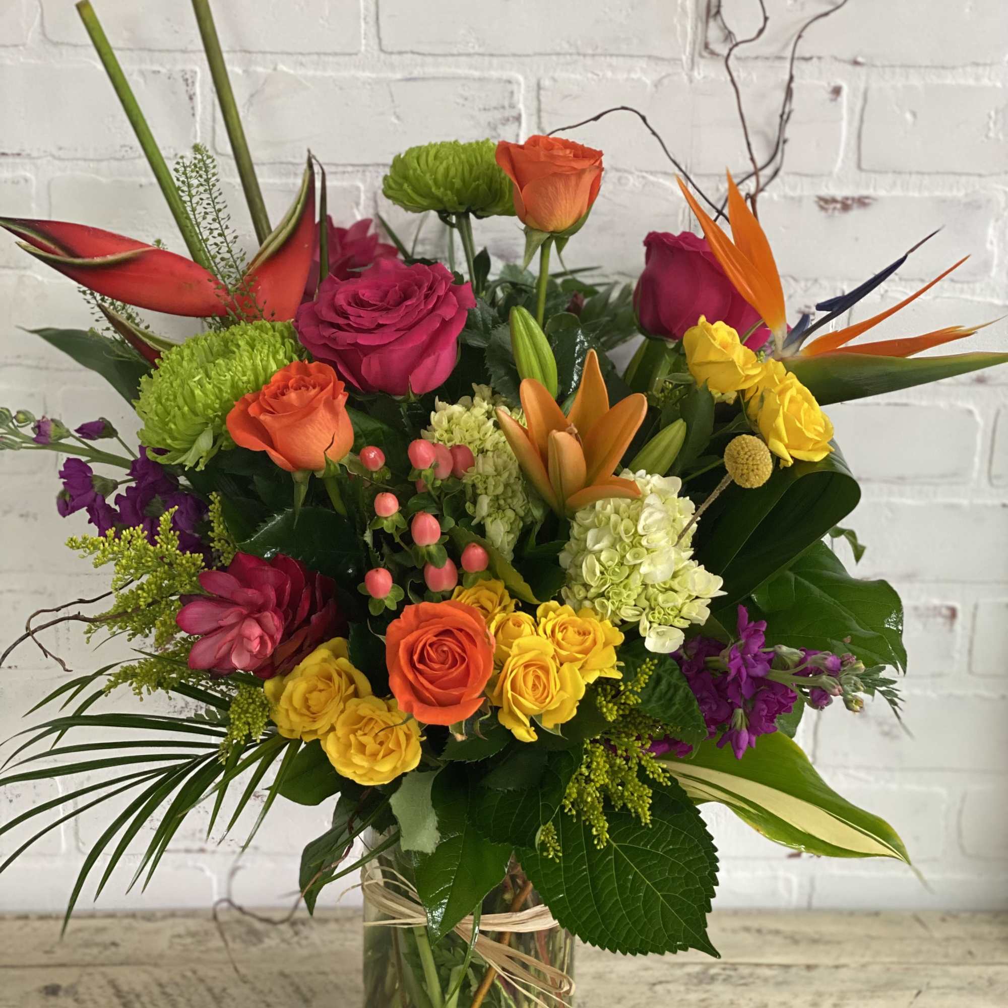 Colorful mixed bouquet in a clear glass vase