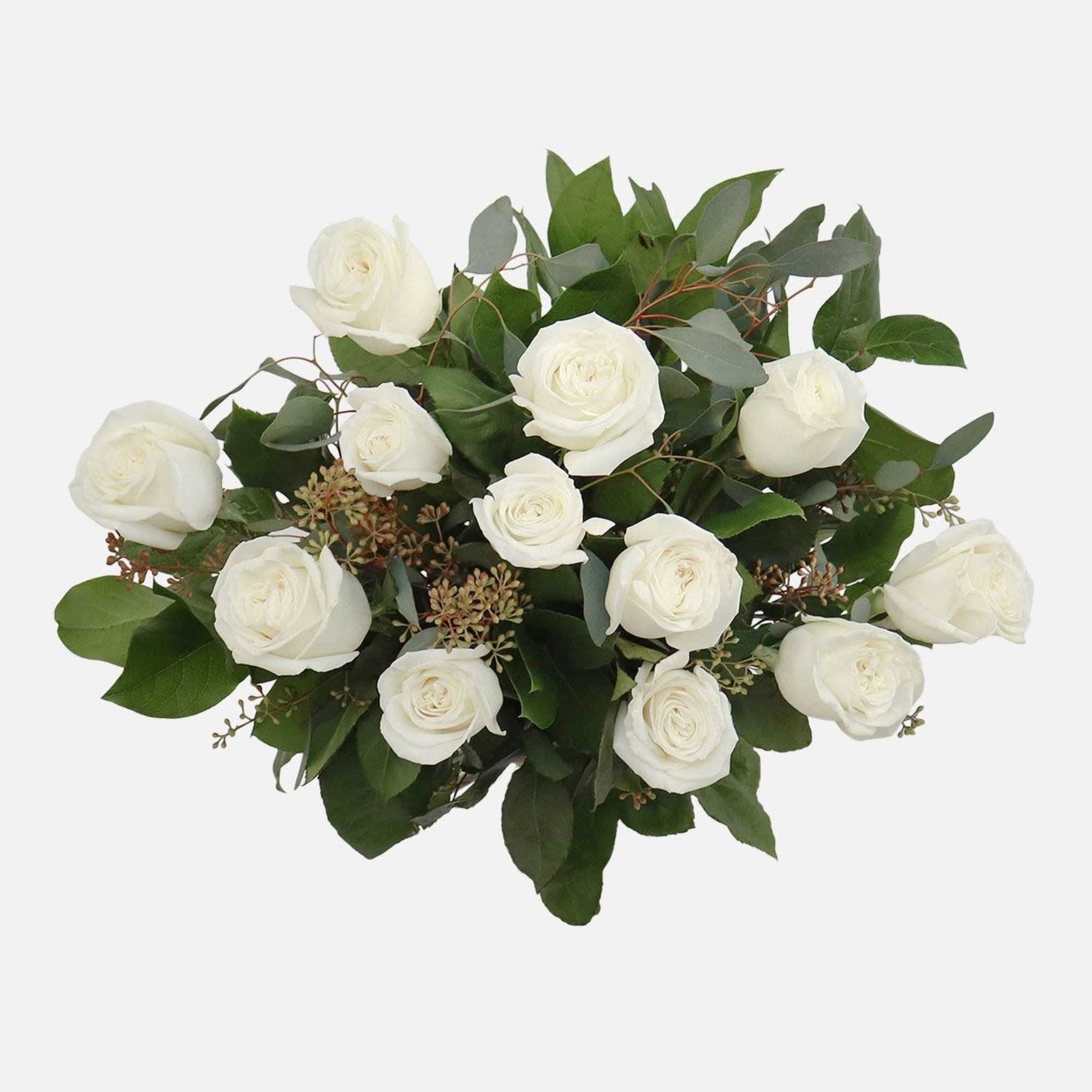 White rose bouquet with greenery on a white background