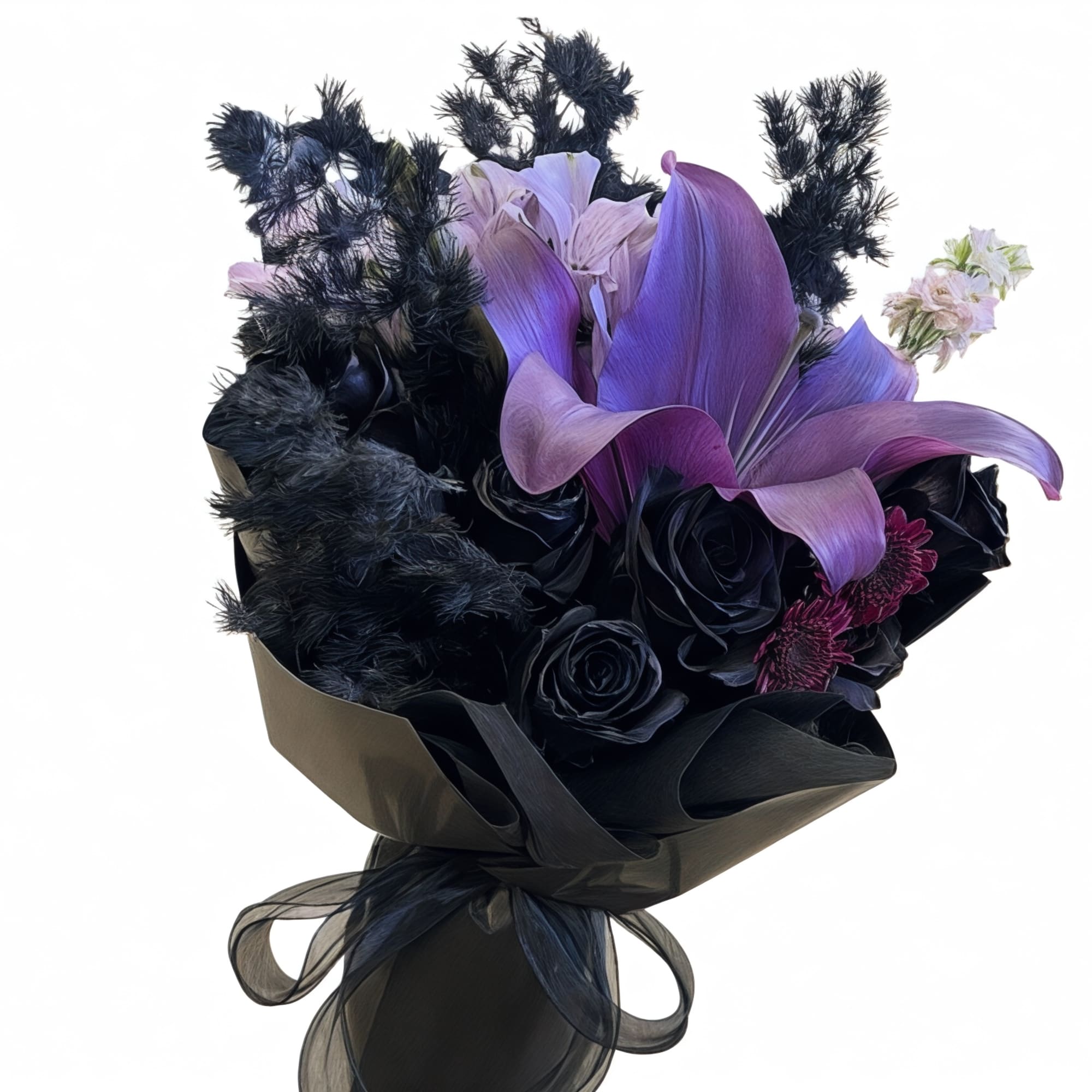 Purple calla lilies and dark roses in black wrapping