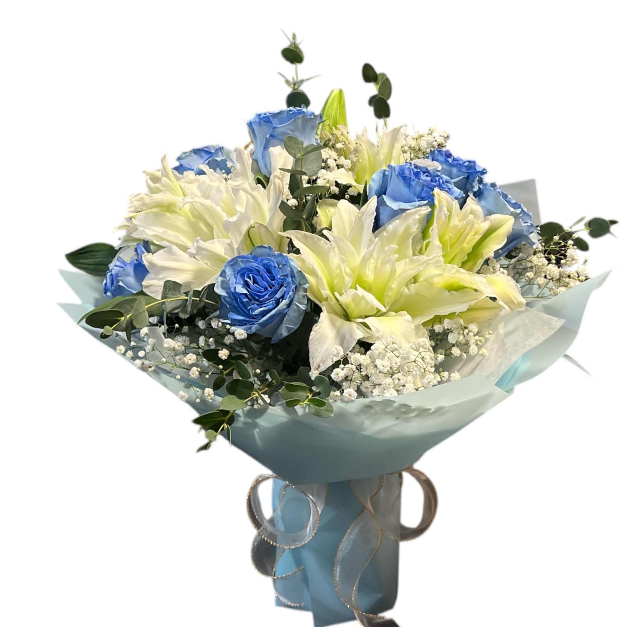 Blue roses, white lilies, and delicate baby&rsquo;s breath in romantic hues.
No need