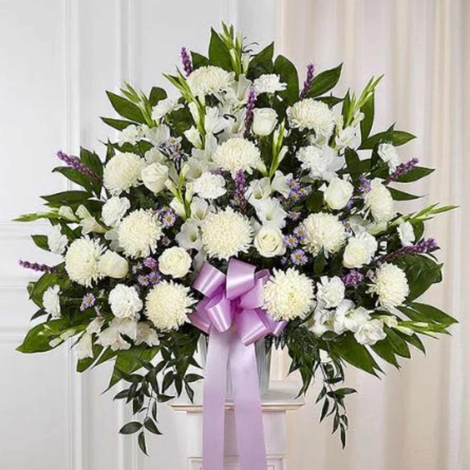 Pet Friendly?
No This arrangement contains Chrysanthemums (Football Mums) and Gladiolus, both of