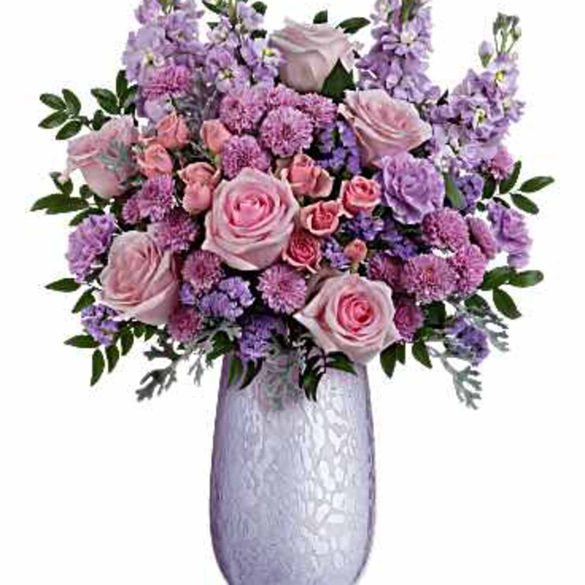 Pink and lavender bouquet in a textured silver vase