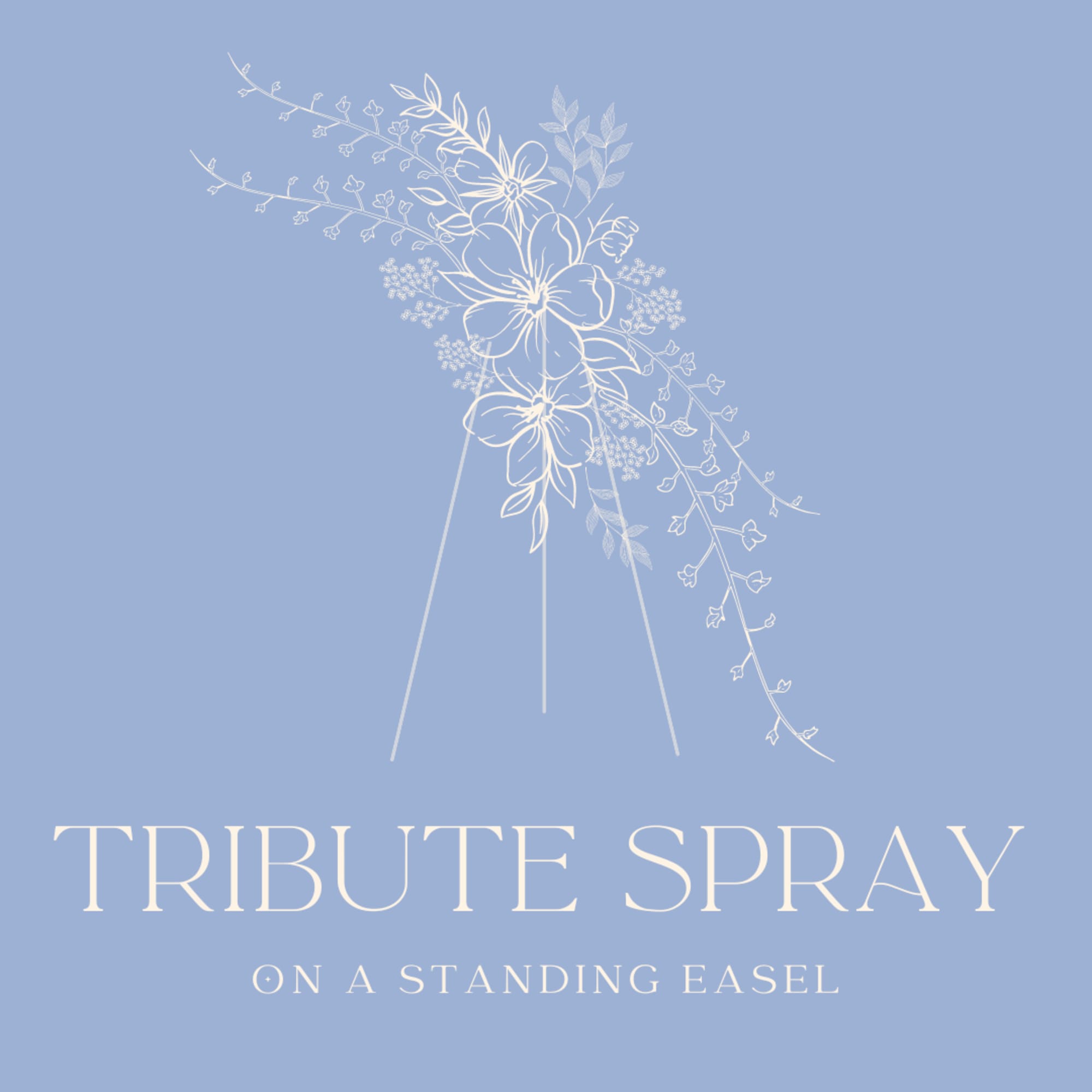 White floral tribute spray on a standing easel against a blue background