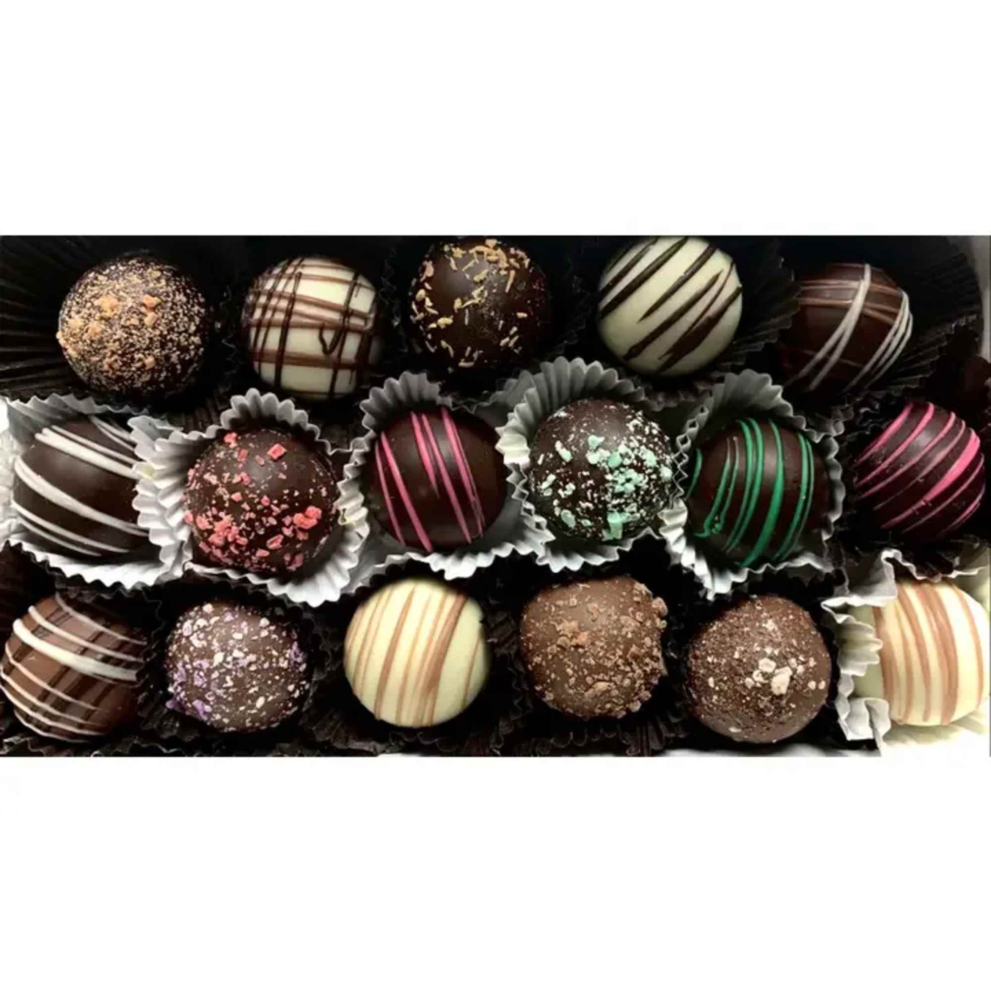 Box of assorted chocolate truffles in paper cups