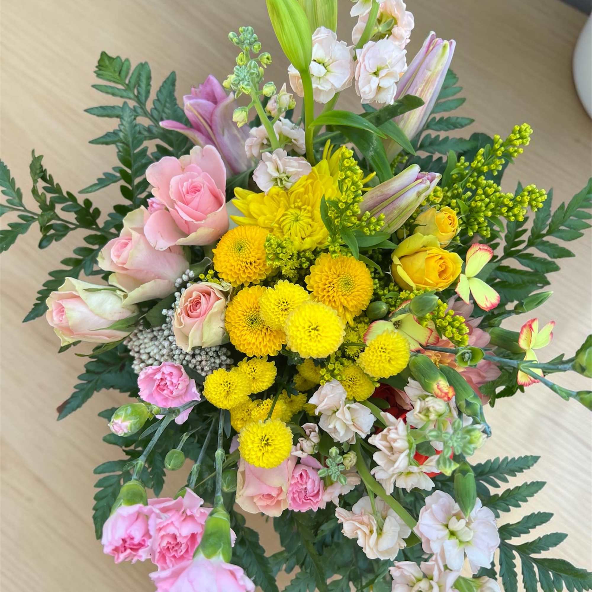 A dreamy blend of soft light pink and delicate pale yellow blooms