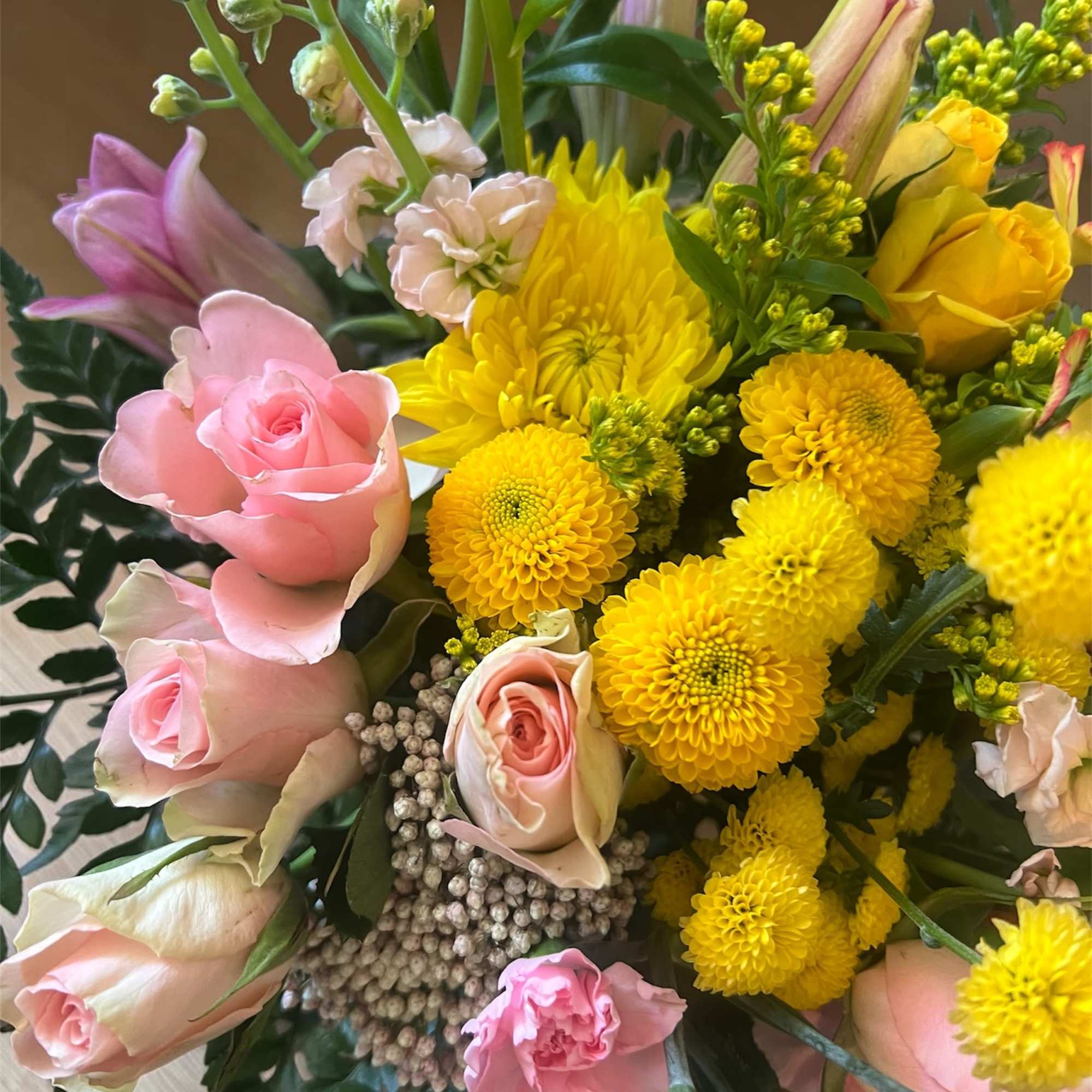 A dreamy blend of soft light pink and delicate pale yellow blooms