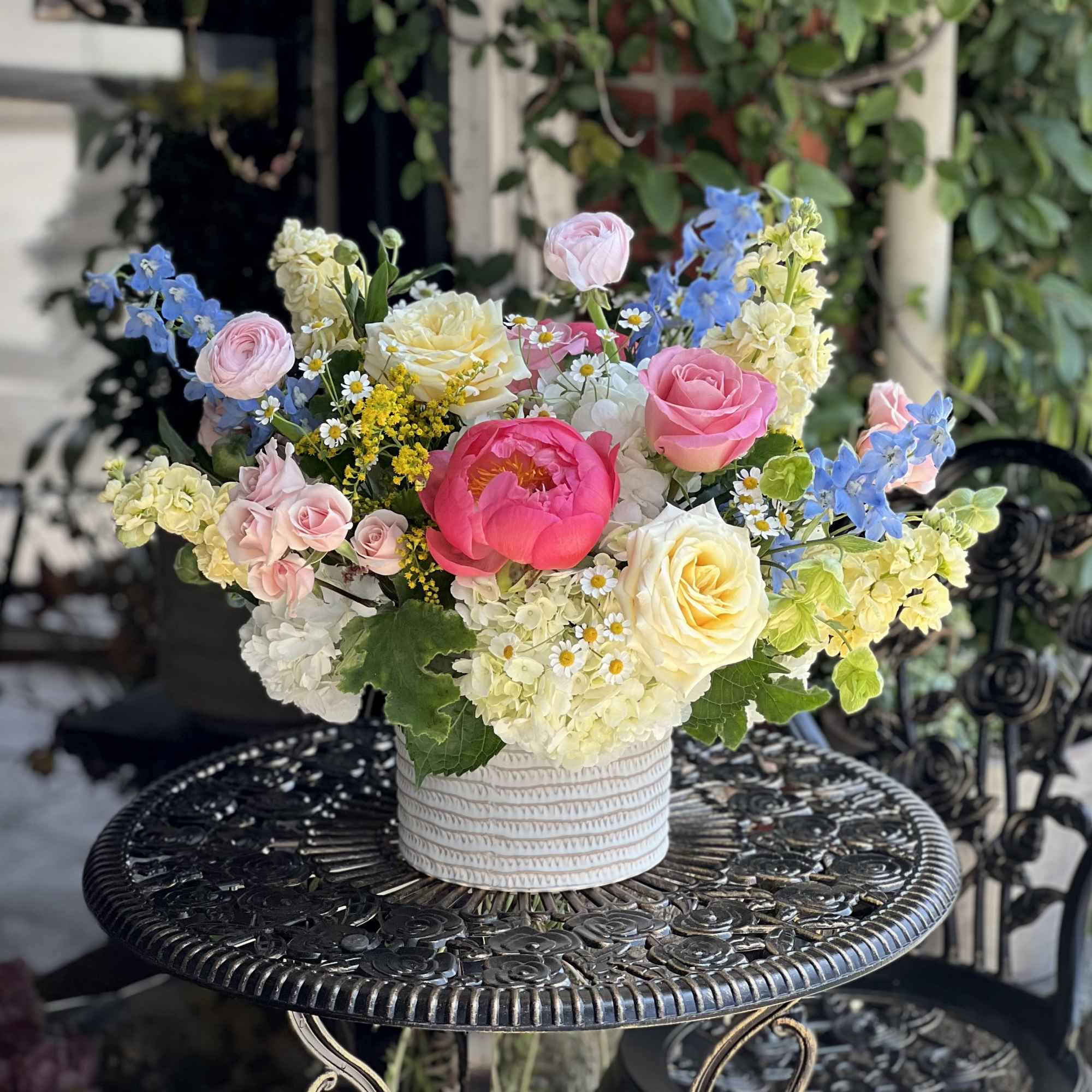 Bursting with color and charm, "English Garden" is a garden-inspired delight featuring