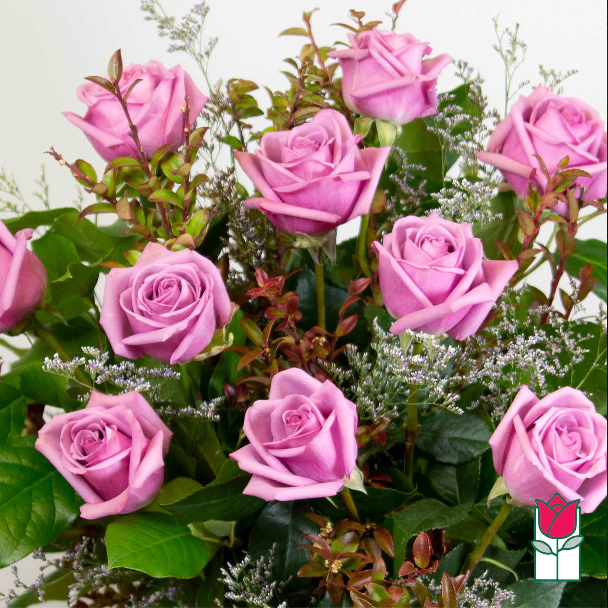 Bouquet of lavender roses with mixed greenery and filler flowers