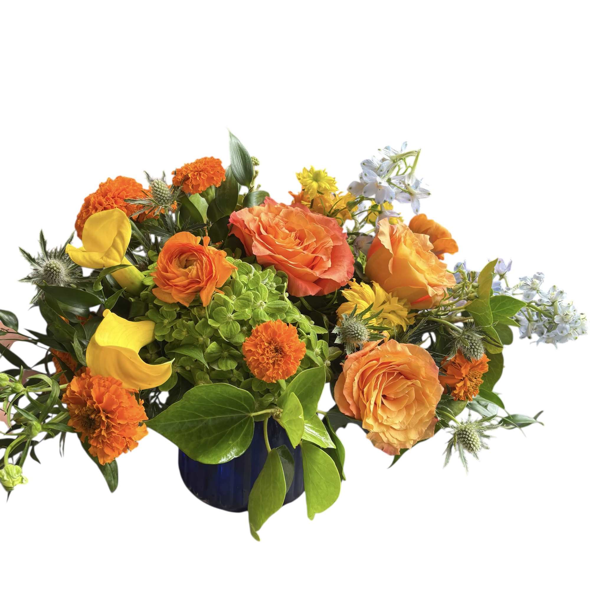 Orange and yellow mixed bouquet in a blue vase