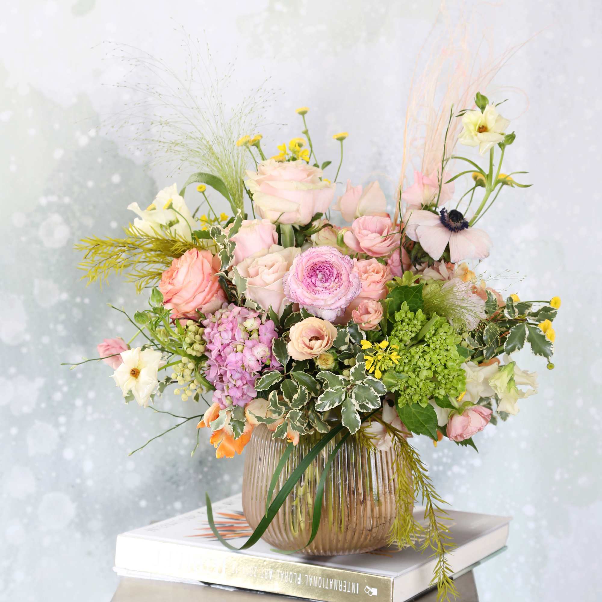  This arrangement creates in the elegance rosy glass vase. A rounder