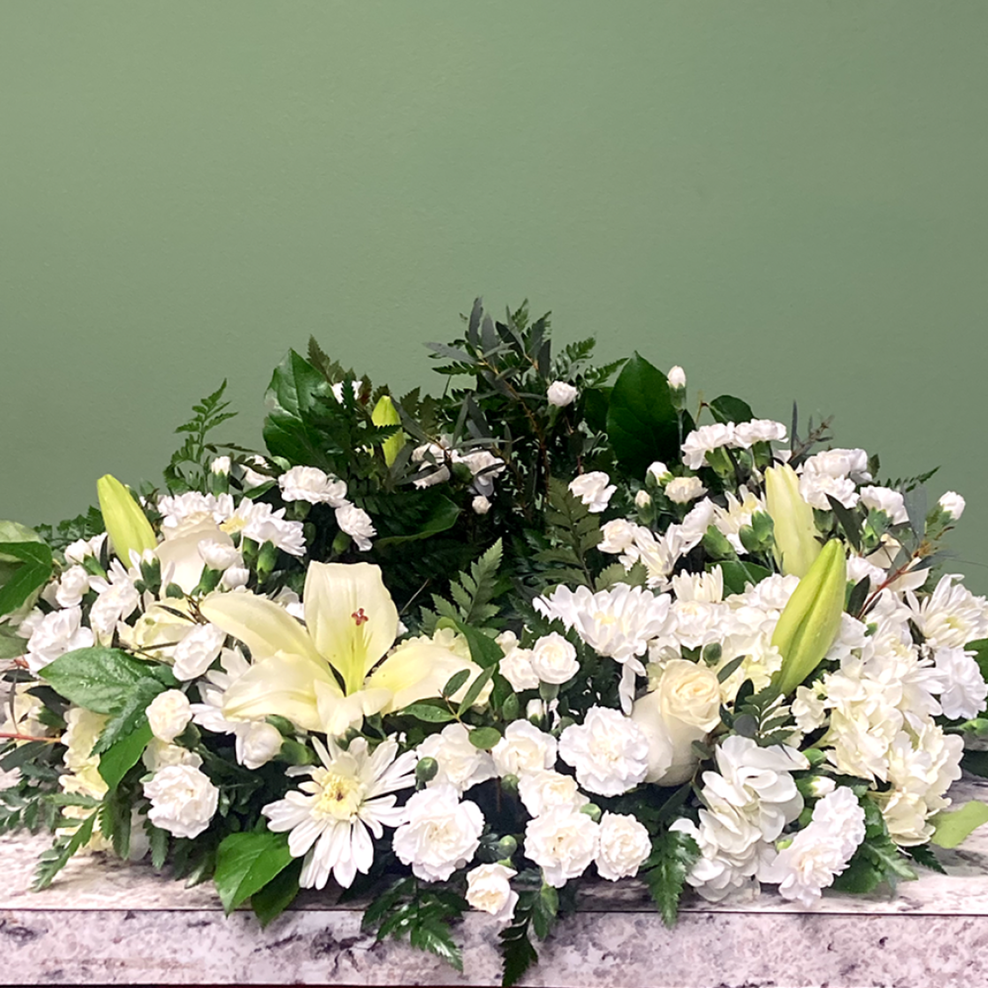 A tranquil urn wreath that honors cherished memories with grace, showcasing a