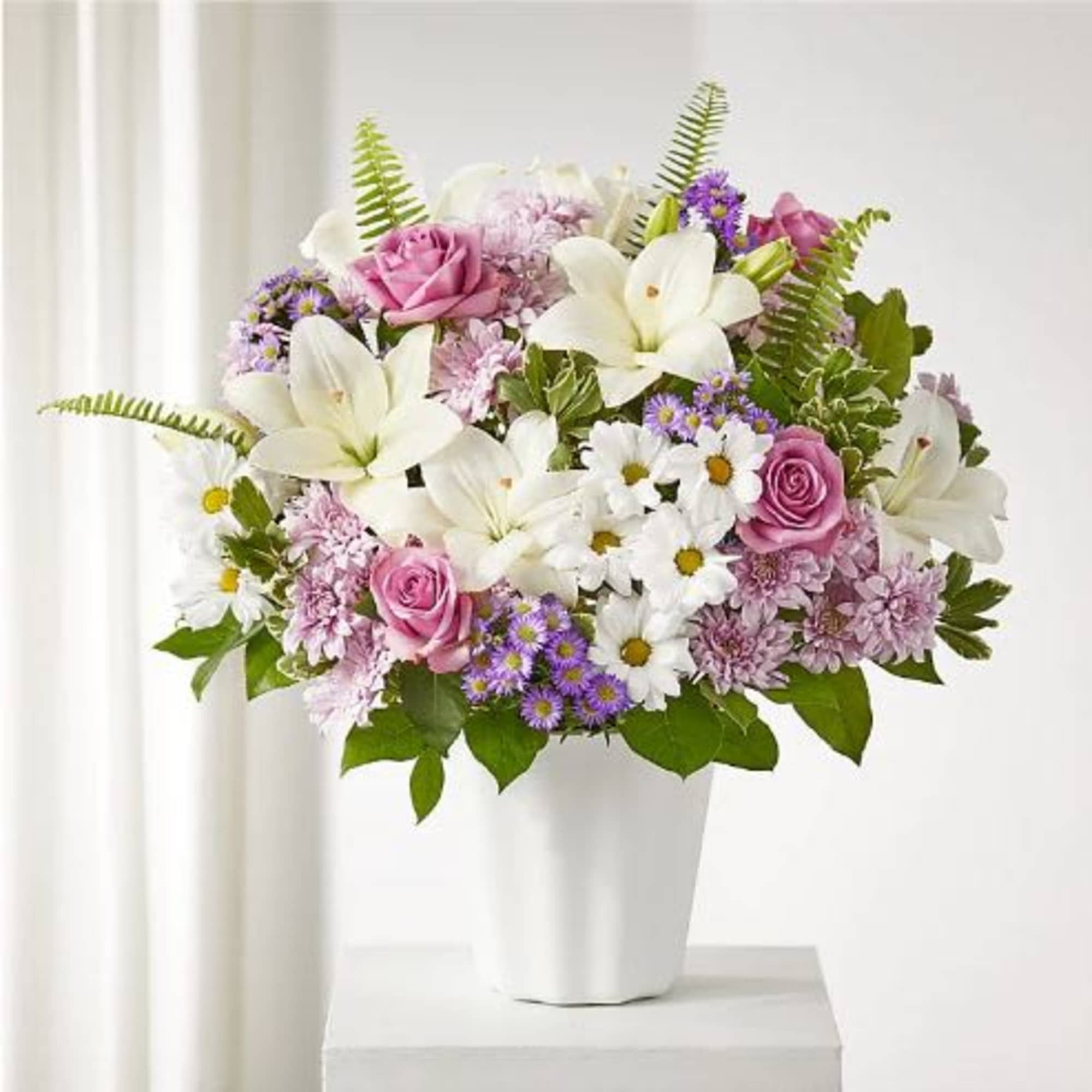  Pet Friendly?
No &ndash; This arrangement contains Chrysanthemums and Daisies, which are