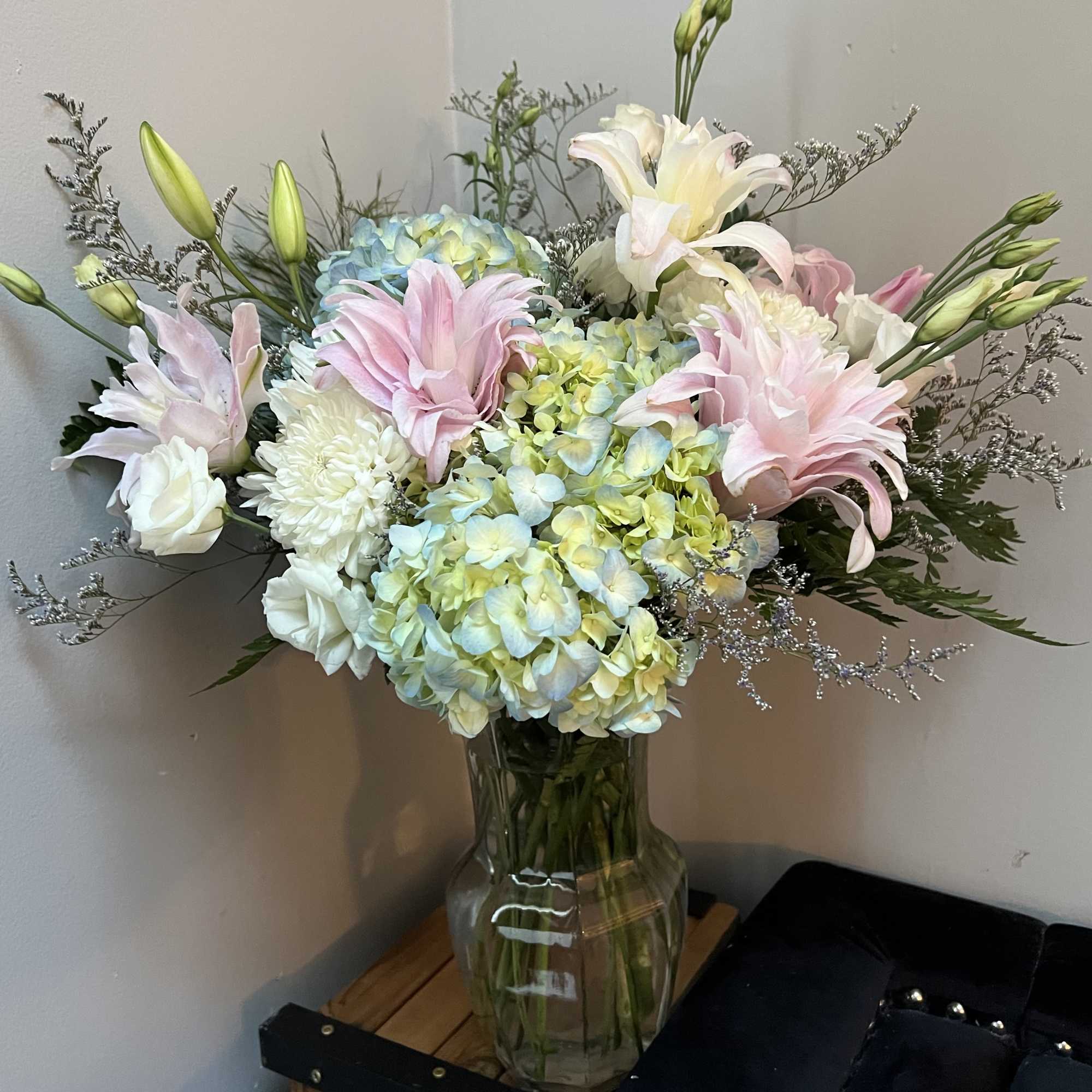 Indulge in the beauty of our meticulously crafted floral arrangement, featuring a