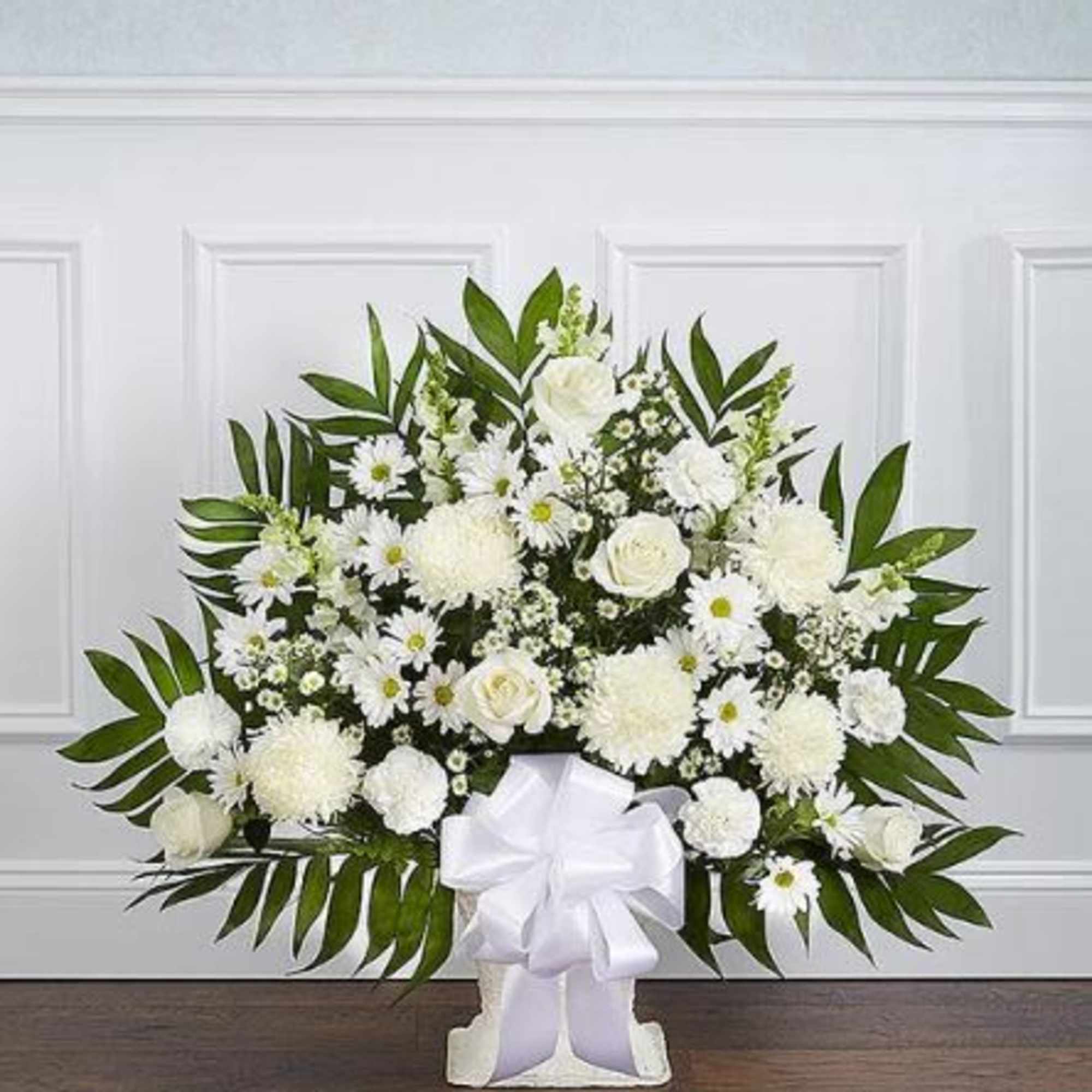 Pet Friendly?
No - This arrangement contains mums (chrysanthemums) and daisies, which are