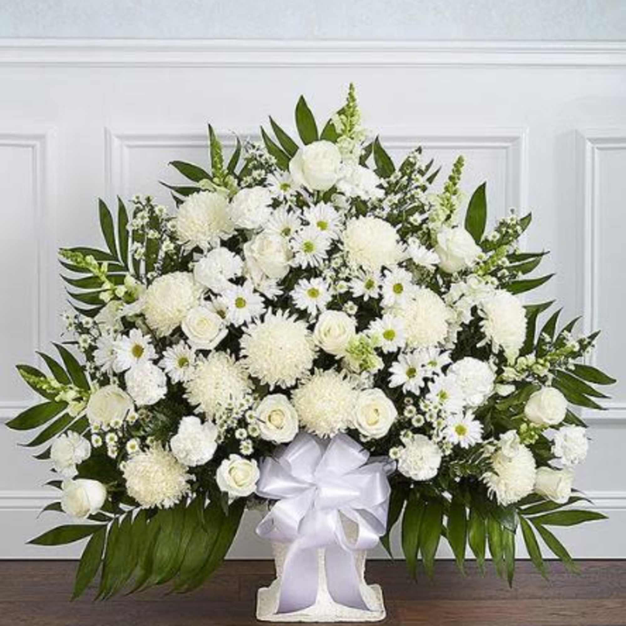 Pet Friendly?
No - This arrangement contains mums (chrysanthemums) and daisies, which are