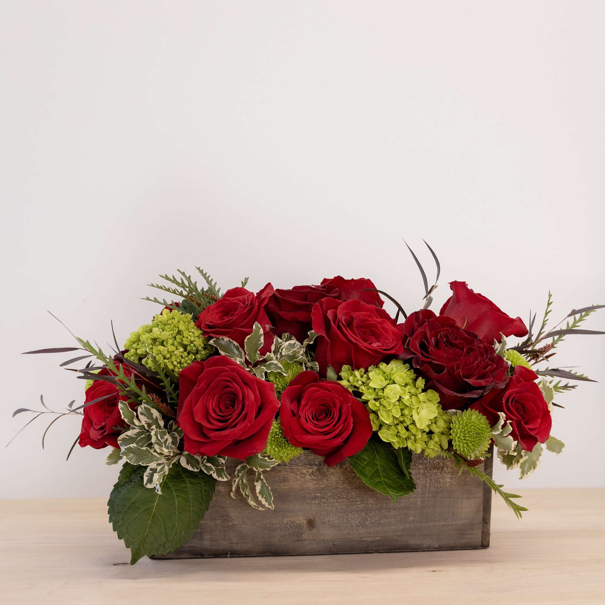 This isn't your classic dozen roses!  Artful design in a wooden