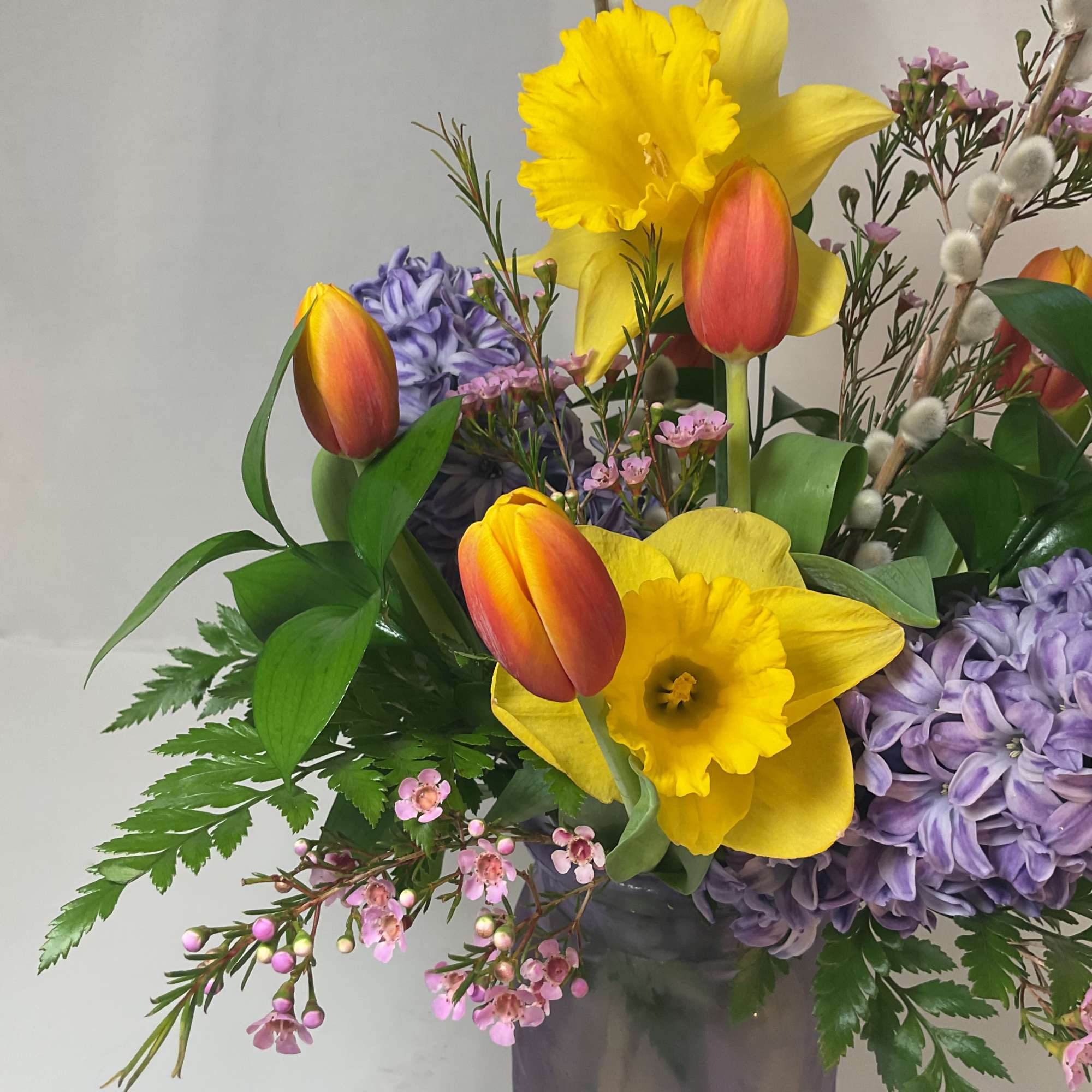 A gorgeous arrangement of fresh and bright seasonal flowers.