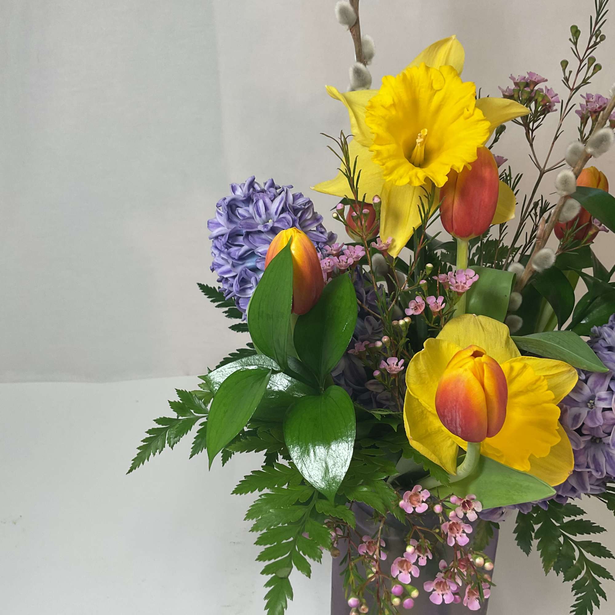A gorgeous arrangement of fresh and bright seasonal flowers.