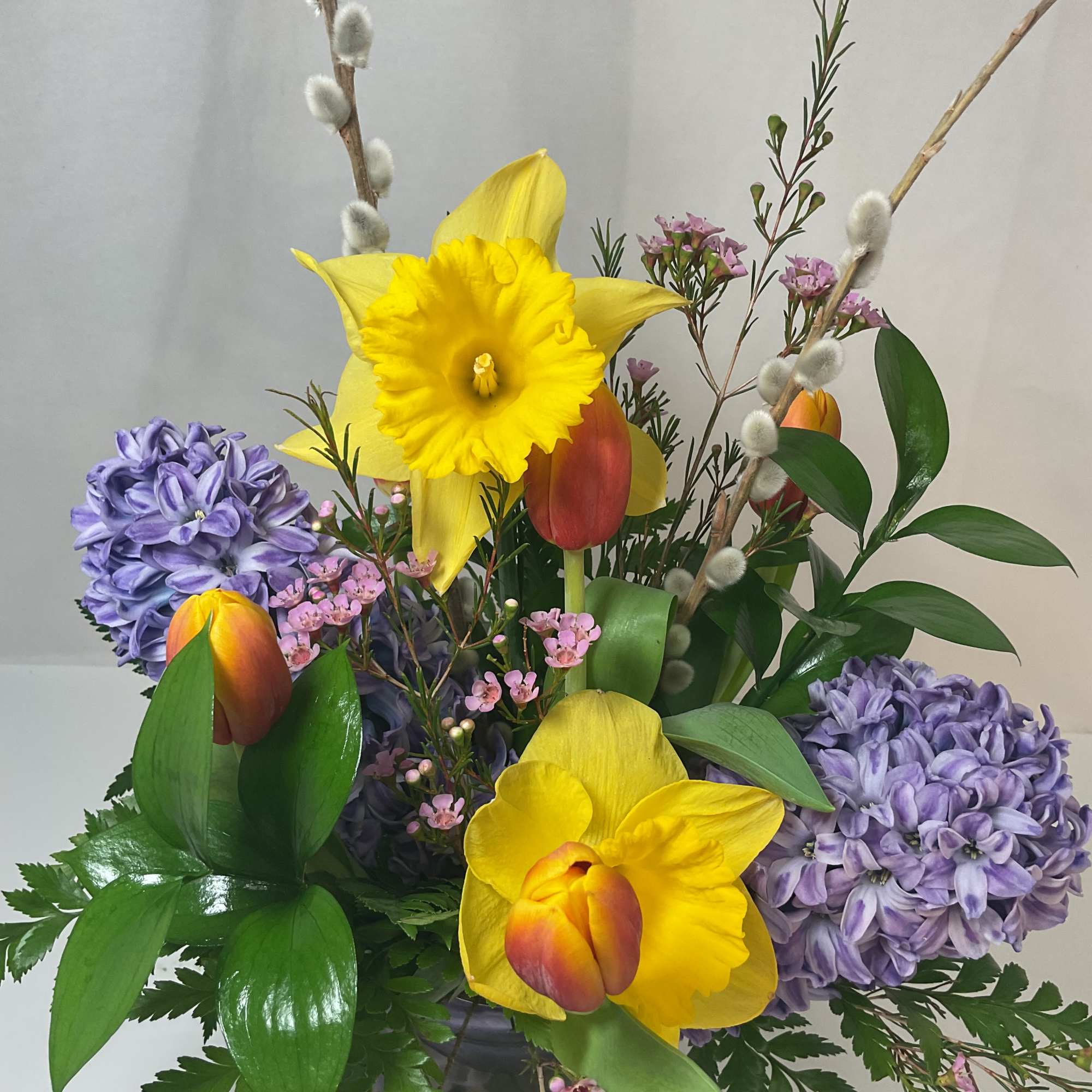 A gorgeous arrangement of fresh and bright seasonal flowers.