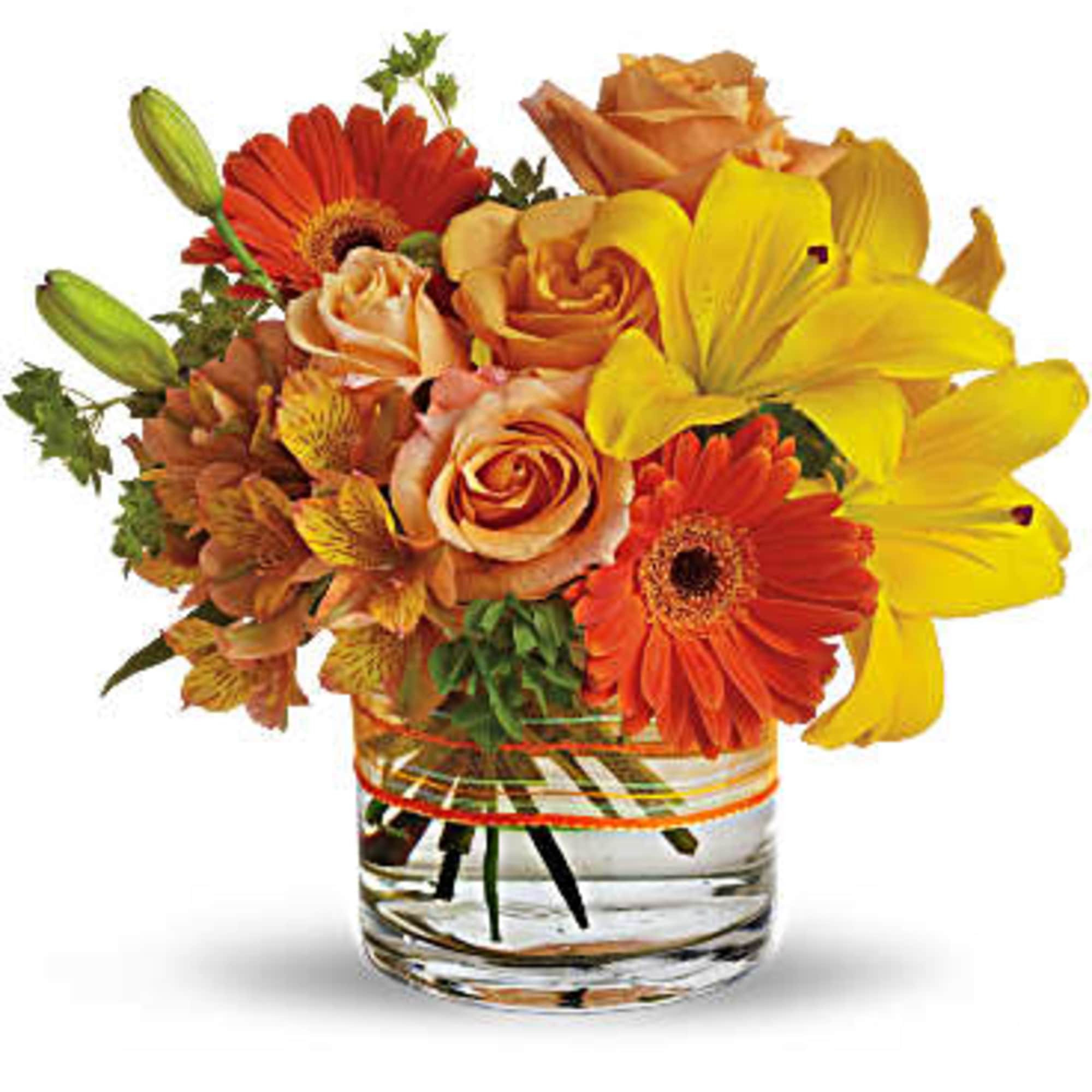 Orange and yellow bouquet in a clear glass vase