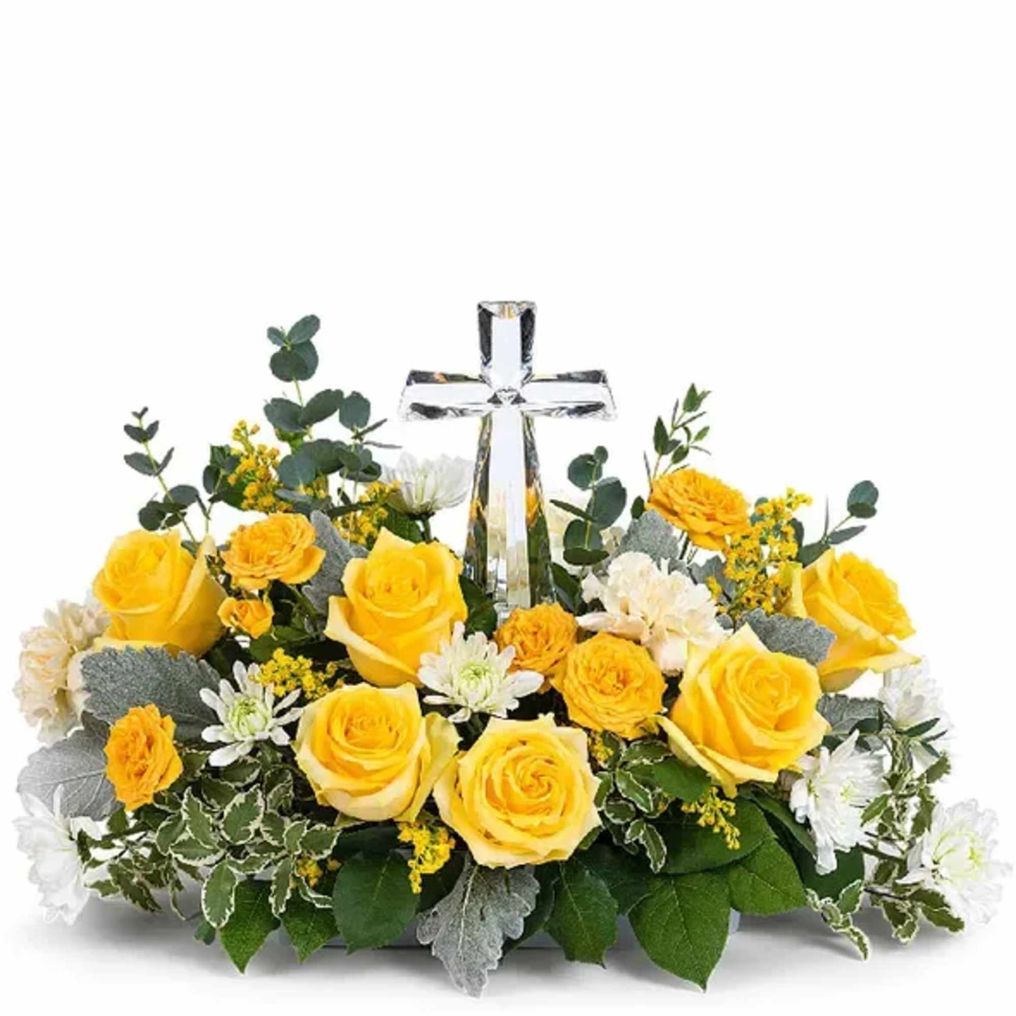 Yellow roses and white flowers arranged around a clear glass cross