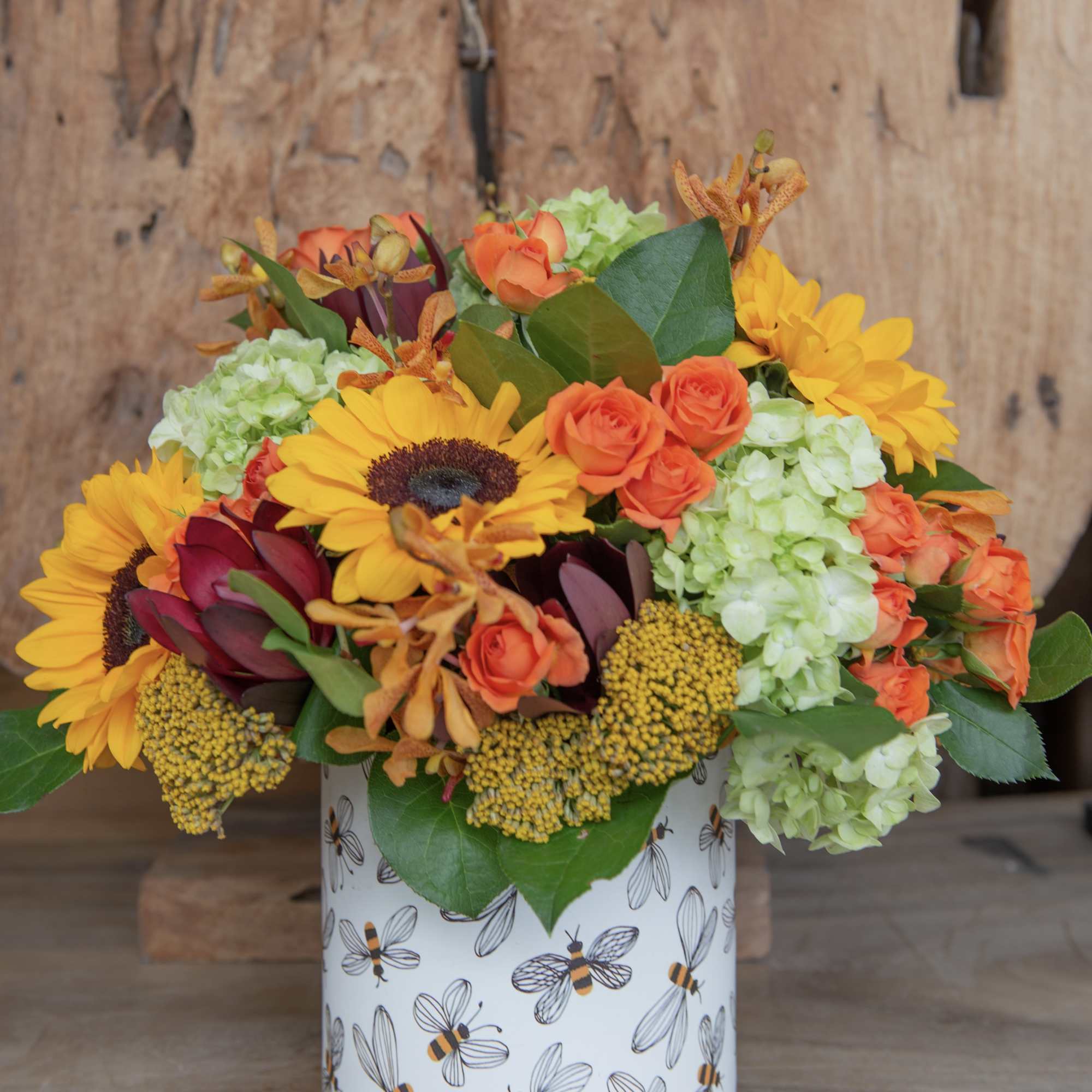 Say hello to autumn with our honey bee ceramic vase filled with