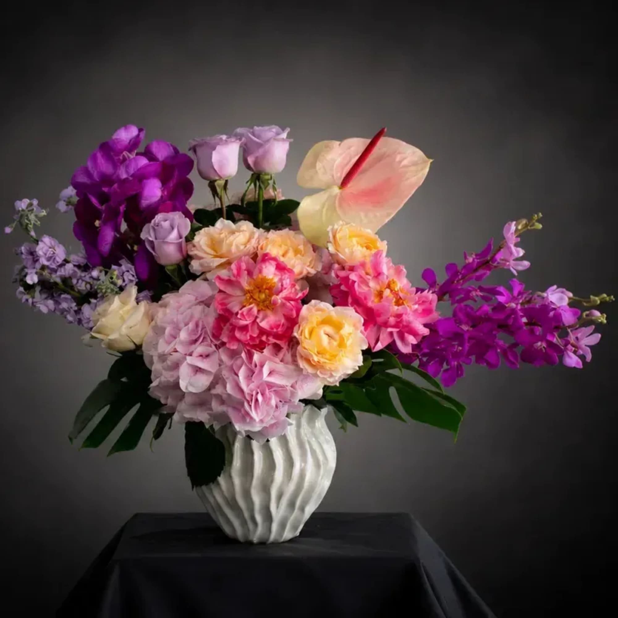 A romantic and artfully composed arrangement, Ros&eacute; Allure blends soft pastel tones