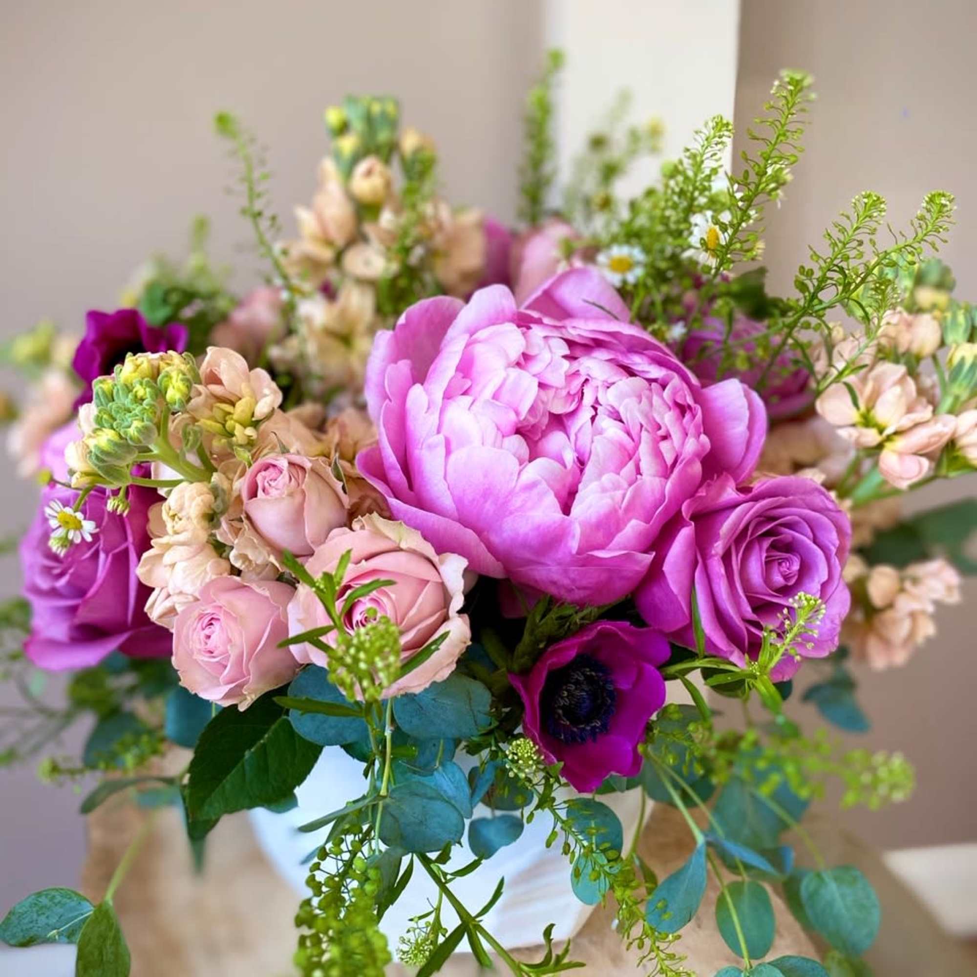 NOTE: Pictures show the DELUXE SIZE arrangement!
This lush arrangement has the power
