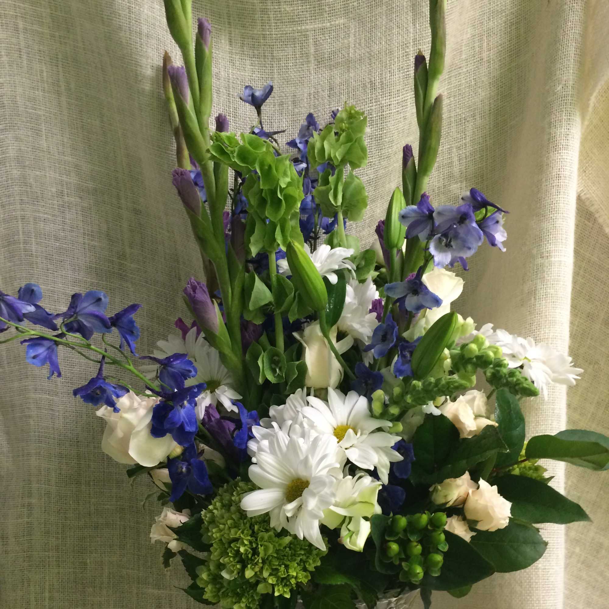 This soft, beautiful arrangement is the perfect design to convey your deepest