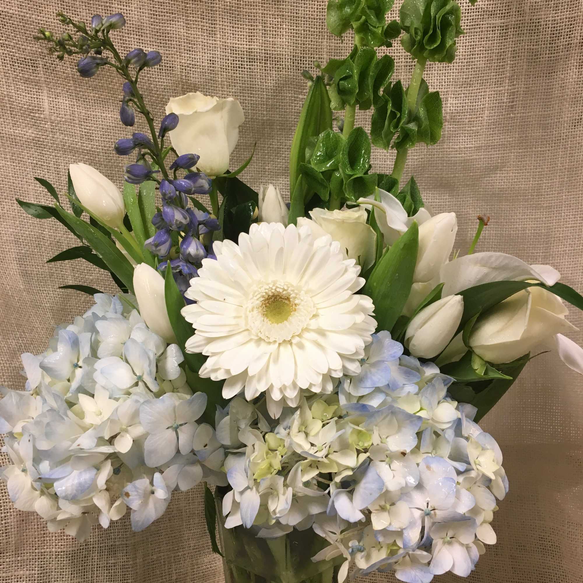 This soft, beautiful arrangement is the perfect design to convey your deepest