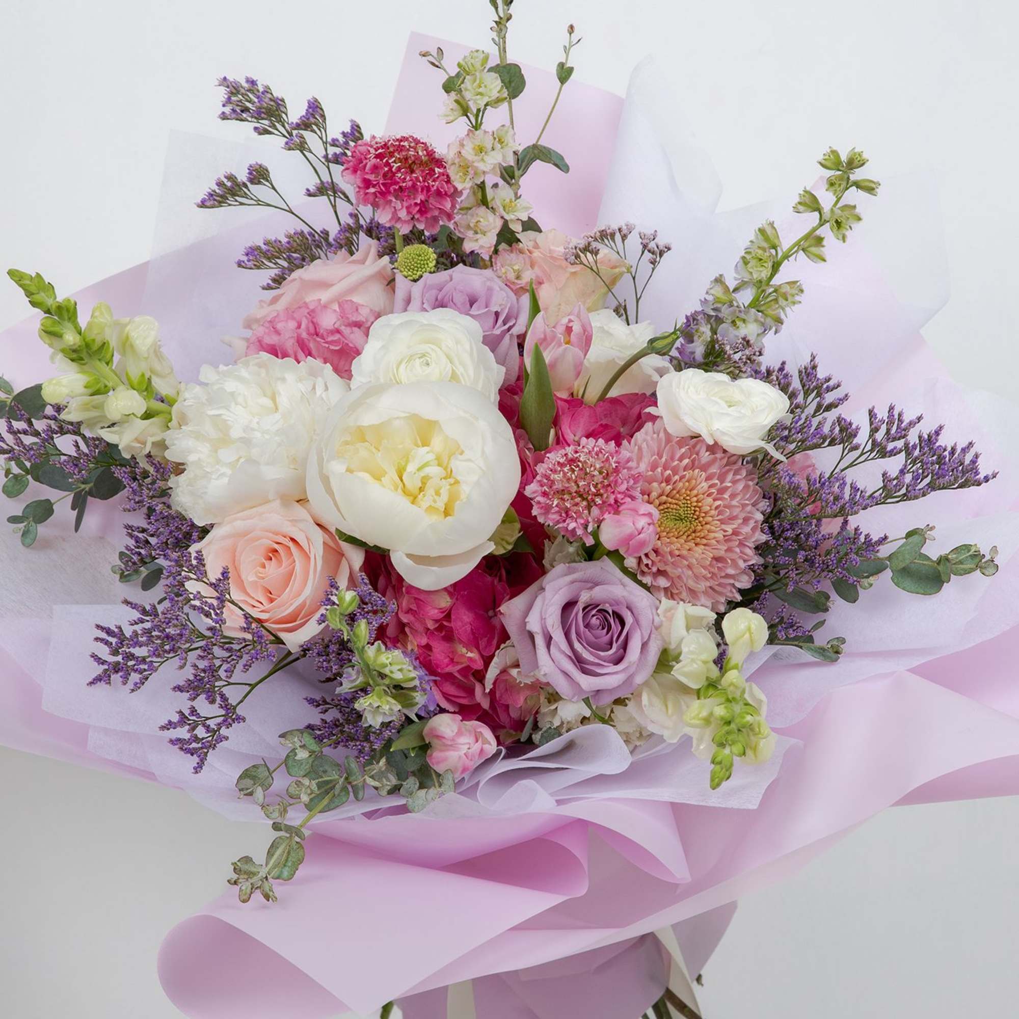 A soft, romantic garden bouquet made with premium seasonal blooms.
This is a