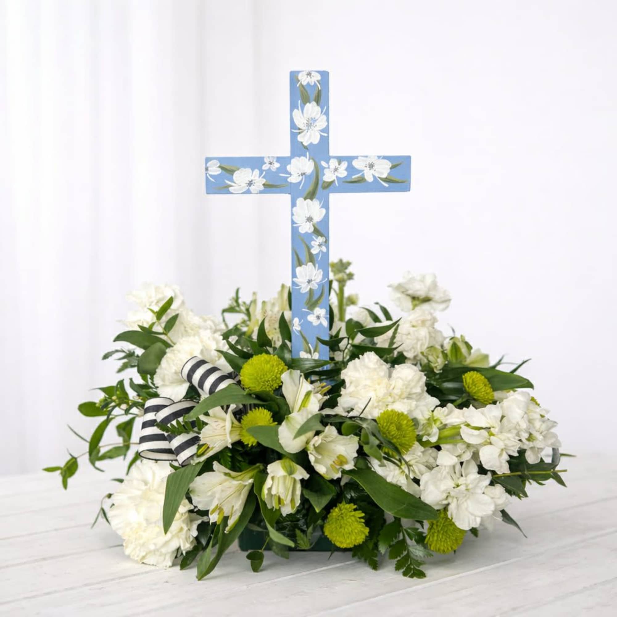 A graceful expression of faith, love, and remembrance, our Peaceful Promise Cross