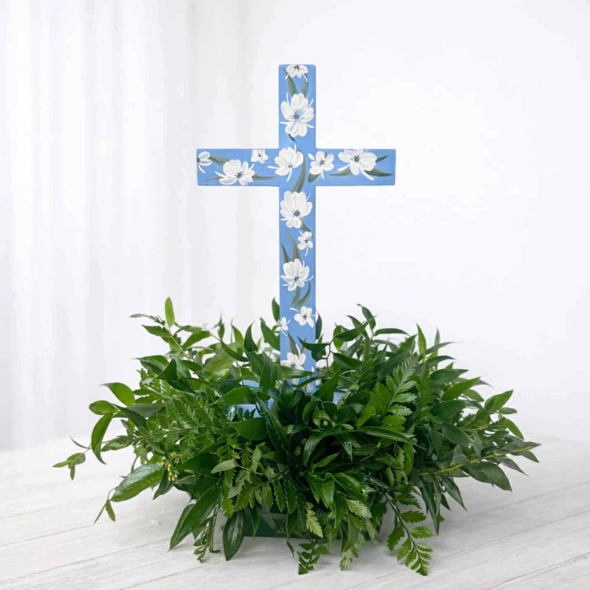 A graceful expression of faith, love, and remembrance, our Peaceful Promise Cross