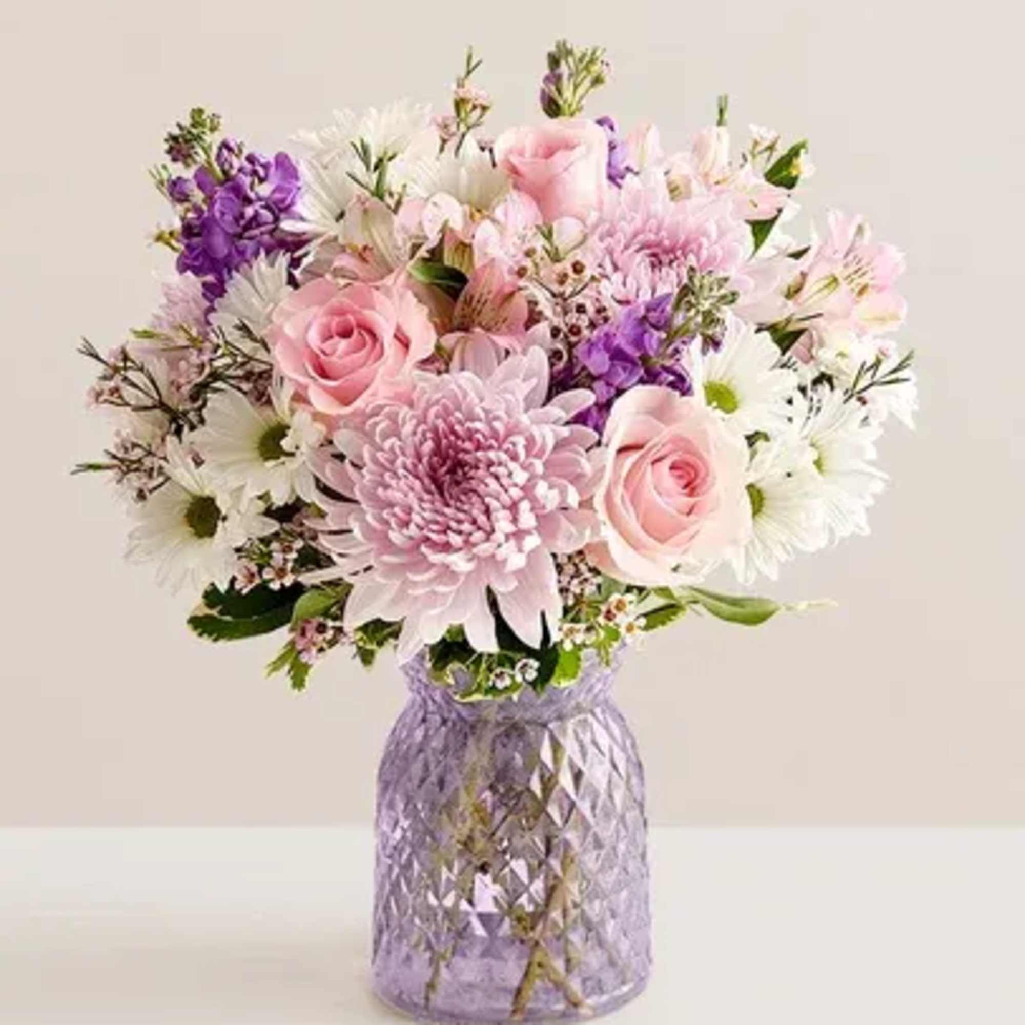 Inspired by the beauty of a blooming backyard garden, our bouquet is