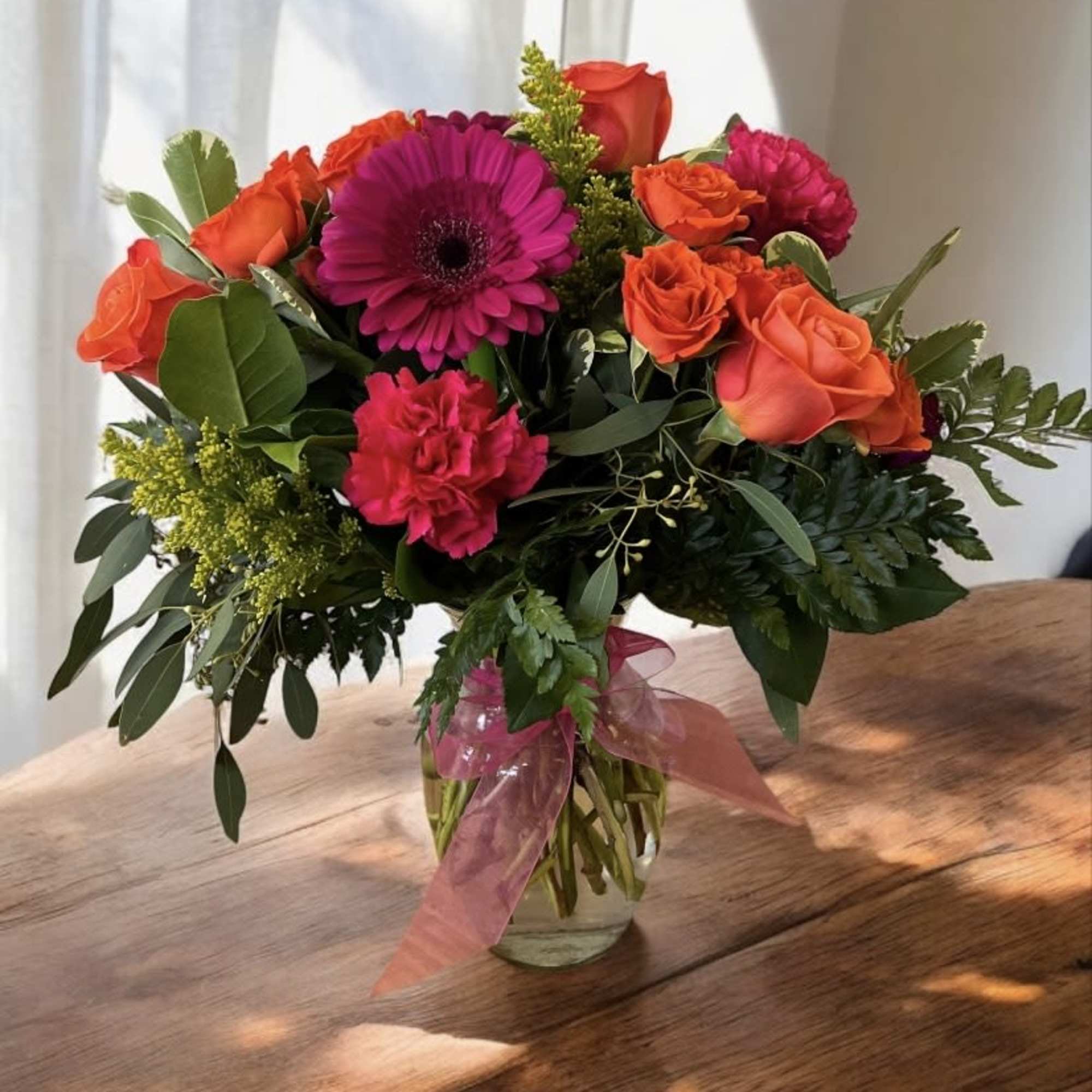 Rainbow blooms in Brentwood, CA | Flowers by Gerry
