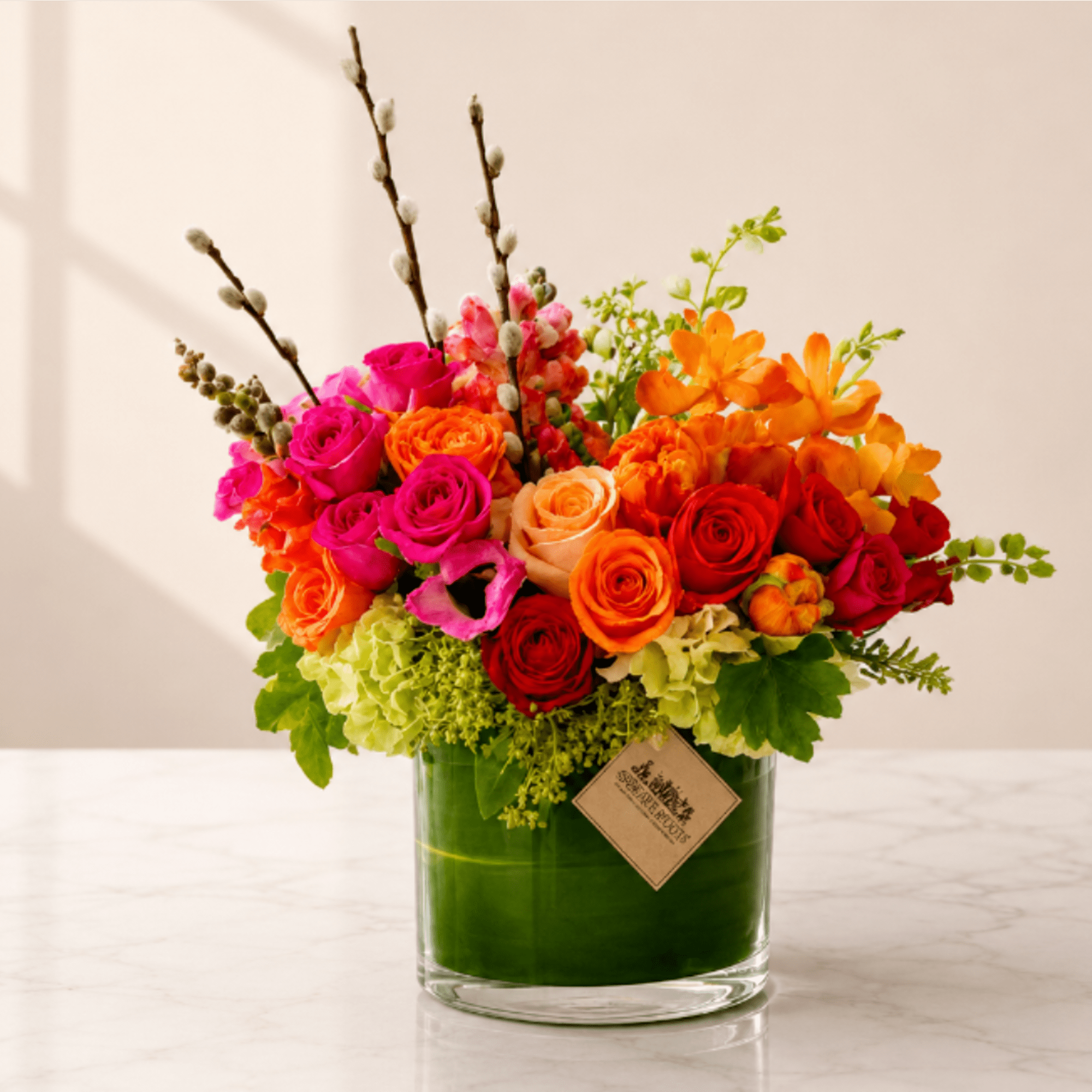 Experience effortless elegance with the Buena Vista Arrangement, a vibrant floral design