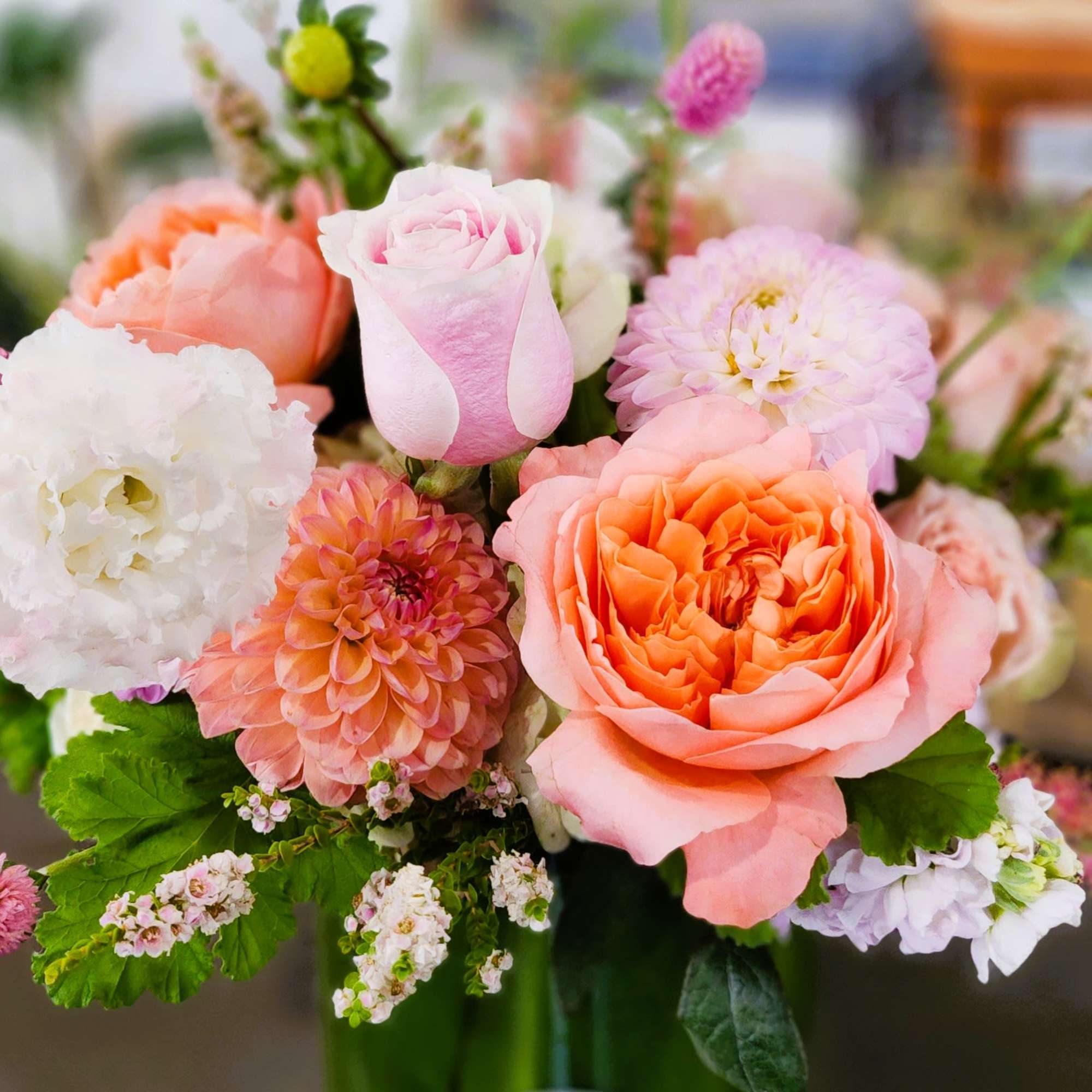 Pink and peach mixed bouquet with roses and dahlias