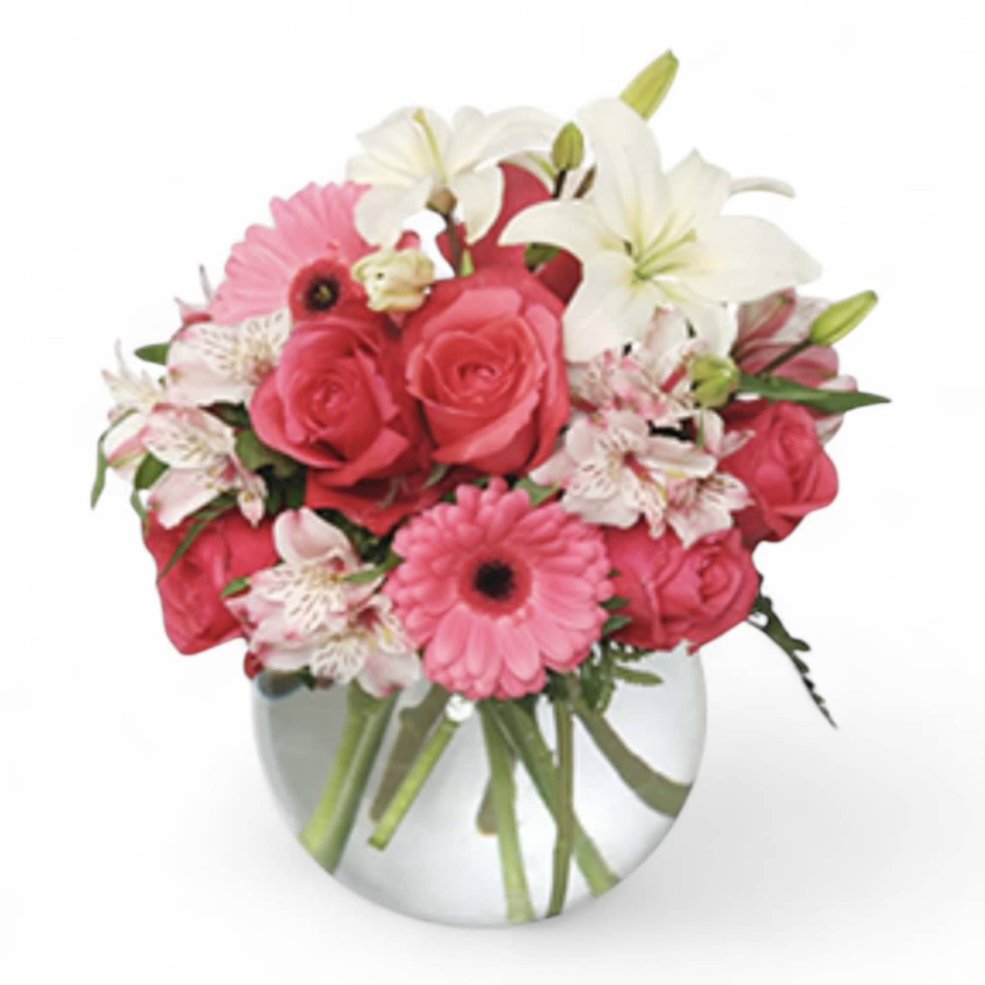 Pink and white mixed bouquet in a clear glass vase