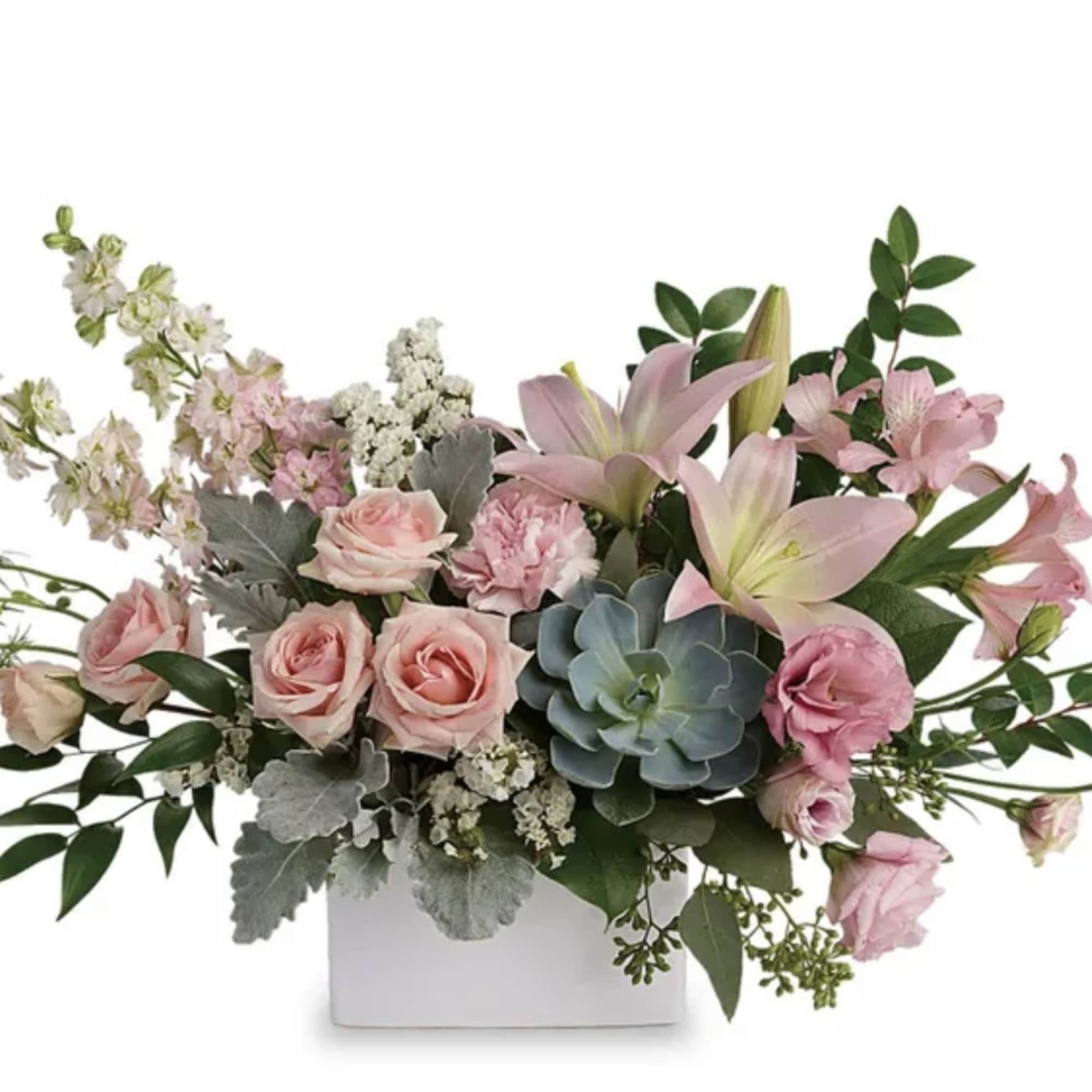 Pink roses and lilies in a white rectangular vase