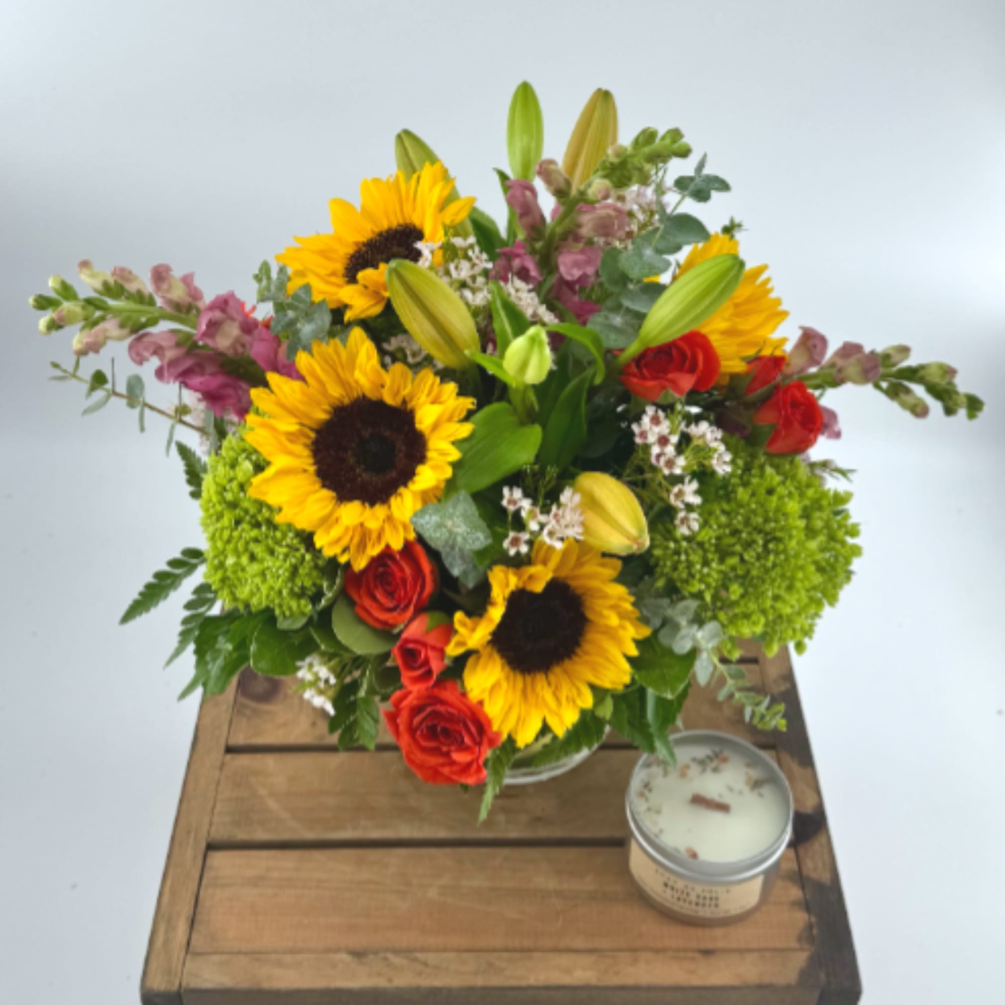 Infuse your space with warmth and joy through this vibrant modern arrangement.