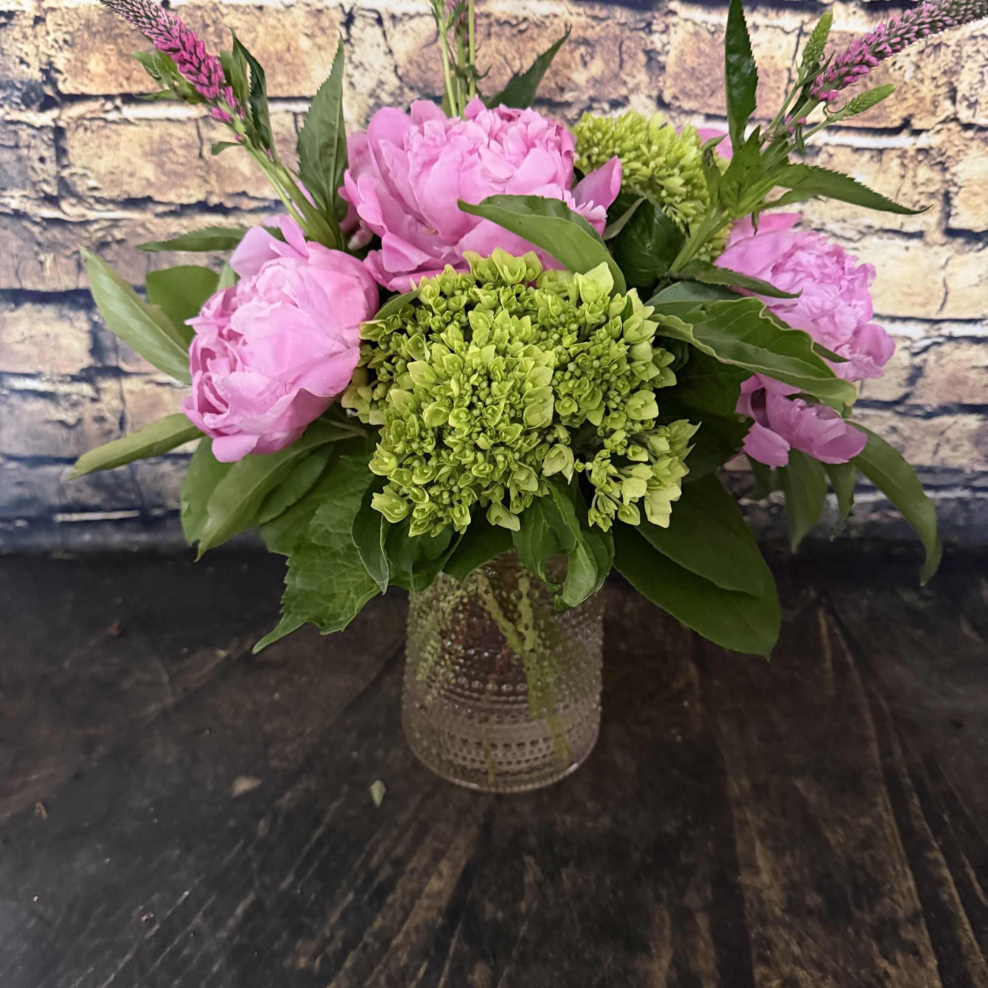 Stunning peonies mixed with mini green hydrangeas and adorned by Veronica in