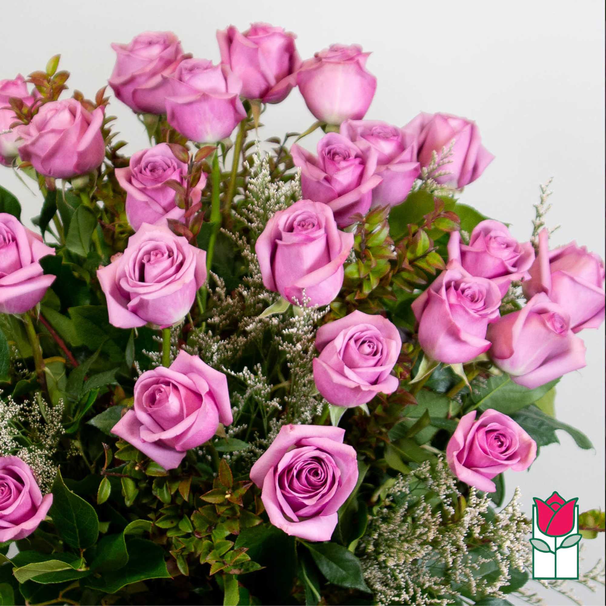 Bouquet of pink roses with mixed greenery