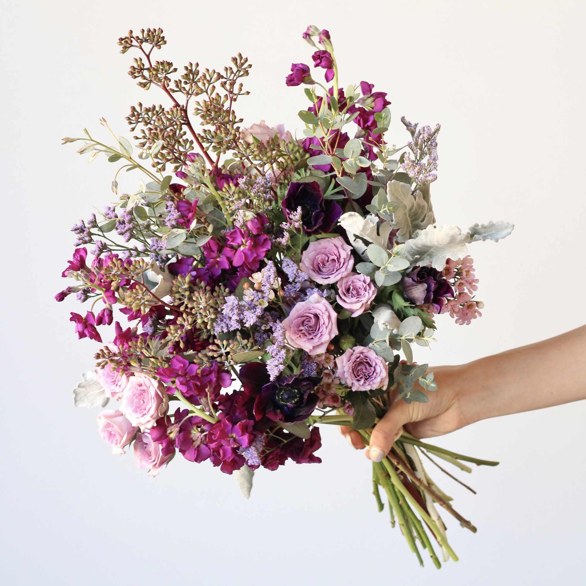 The Amethyst Bouquet features a balanced mix of soft lavender and deep