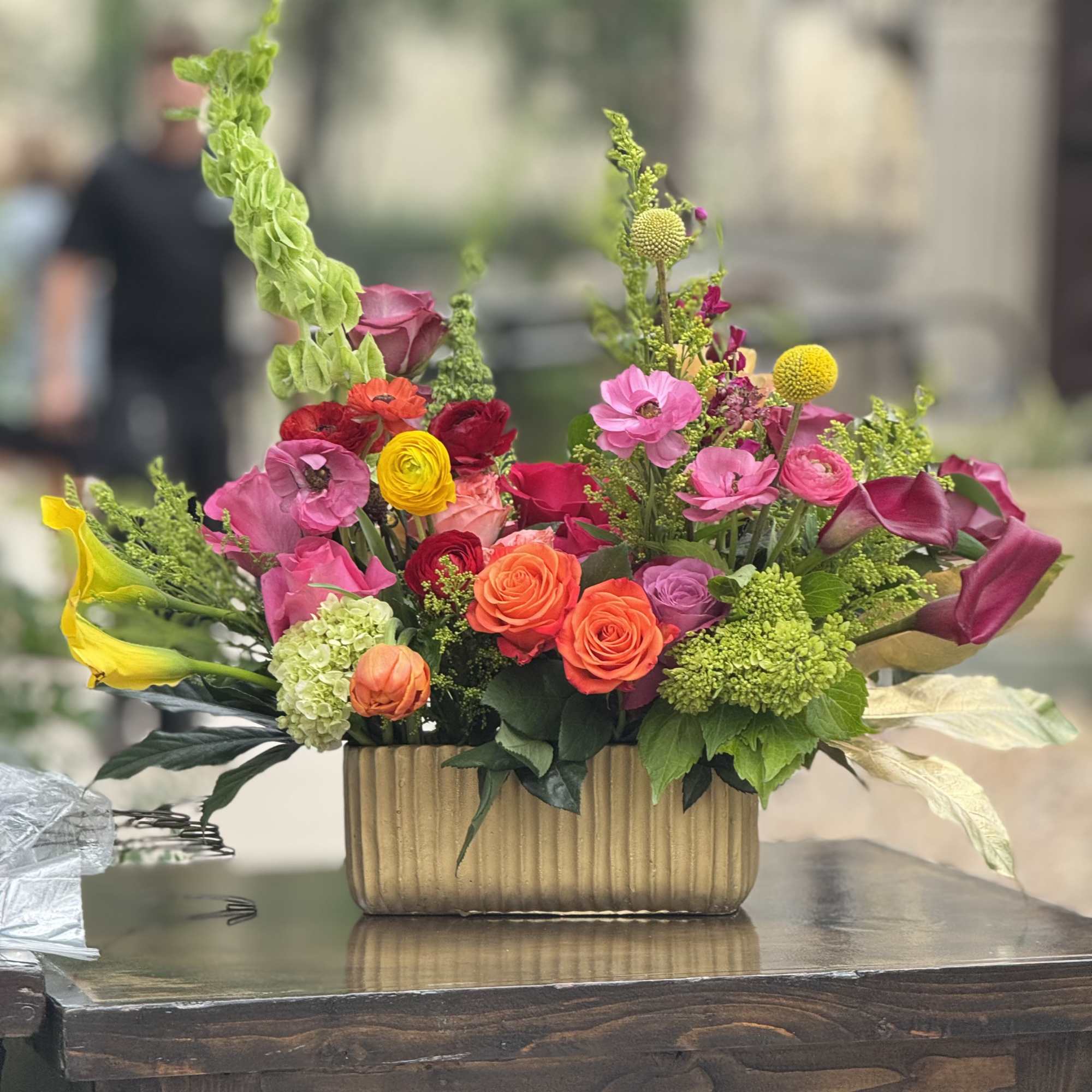 Bright, joyful color pops of pink, coral, orange, yellow and magenta come