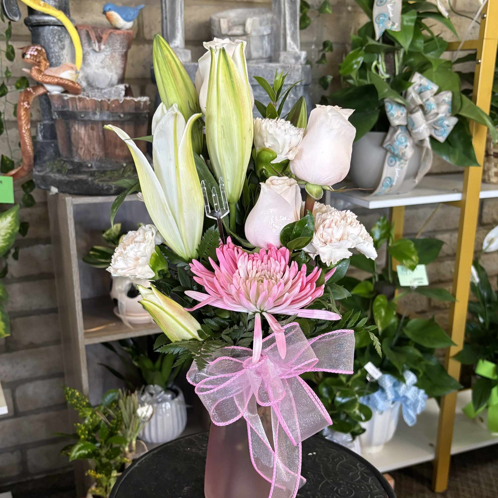 Reasonable flower substitutions may be made due to availability
