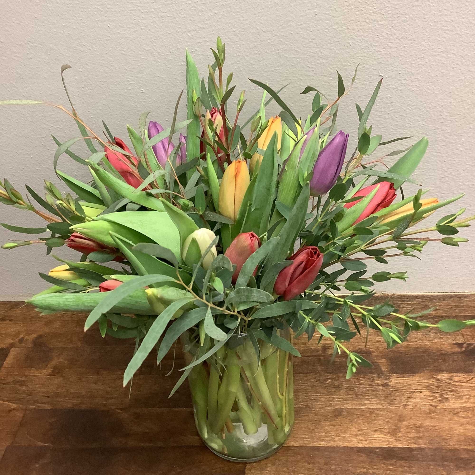 24 assorted tulips herald the arrival of the season, beautifully designed in