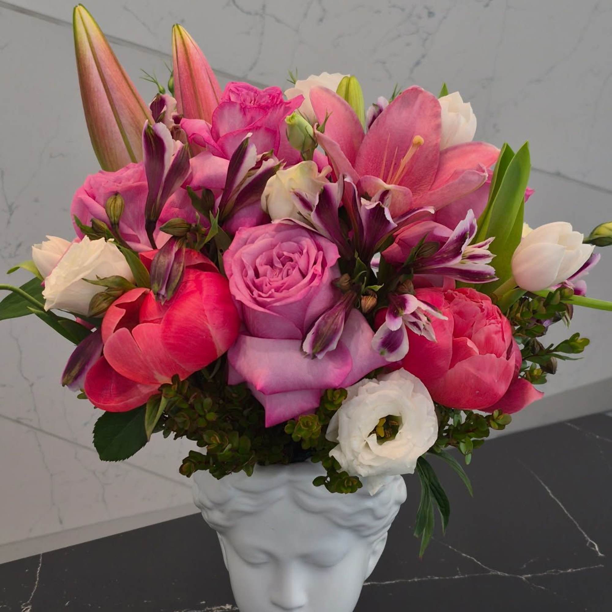 A garden of flowers in Goddess vase