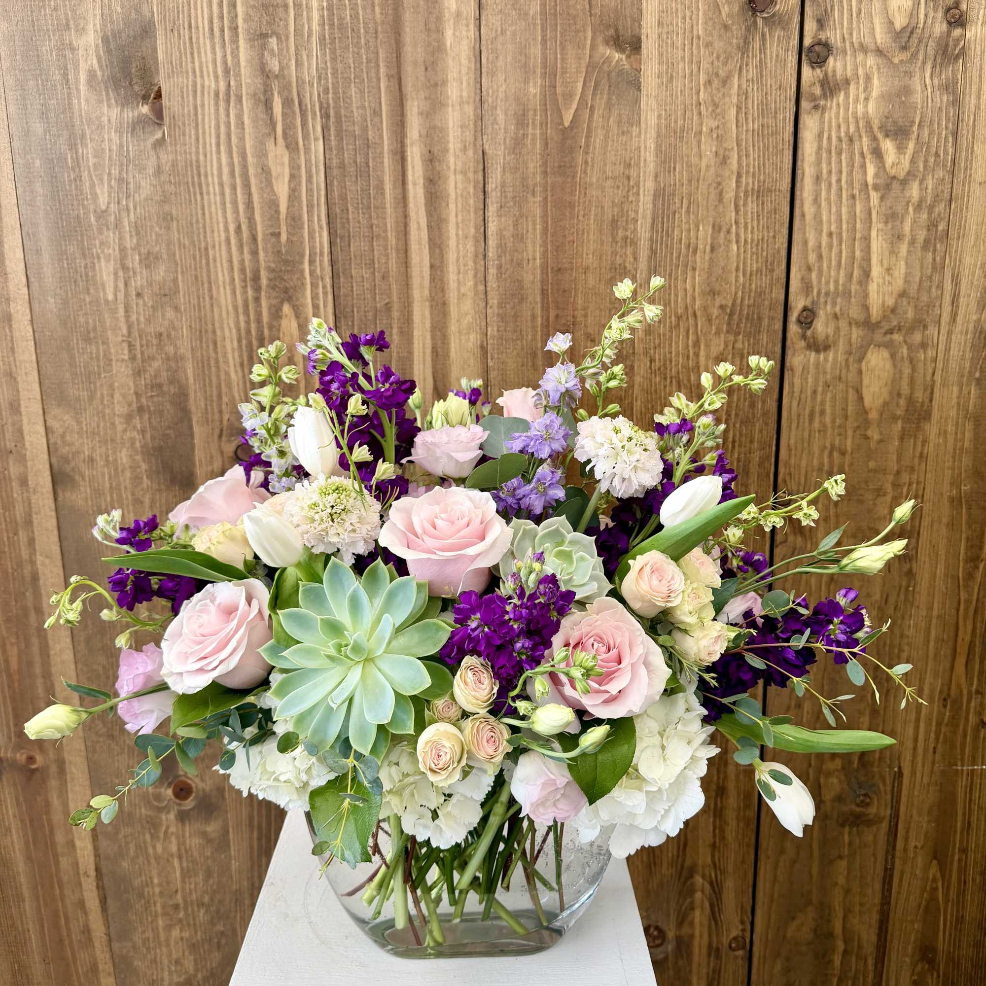 beautiful selection of premium flowers in pinks, lavenders and purples