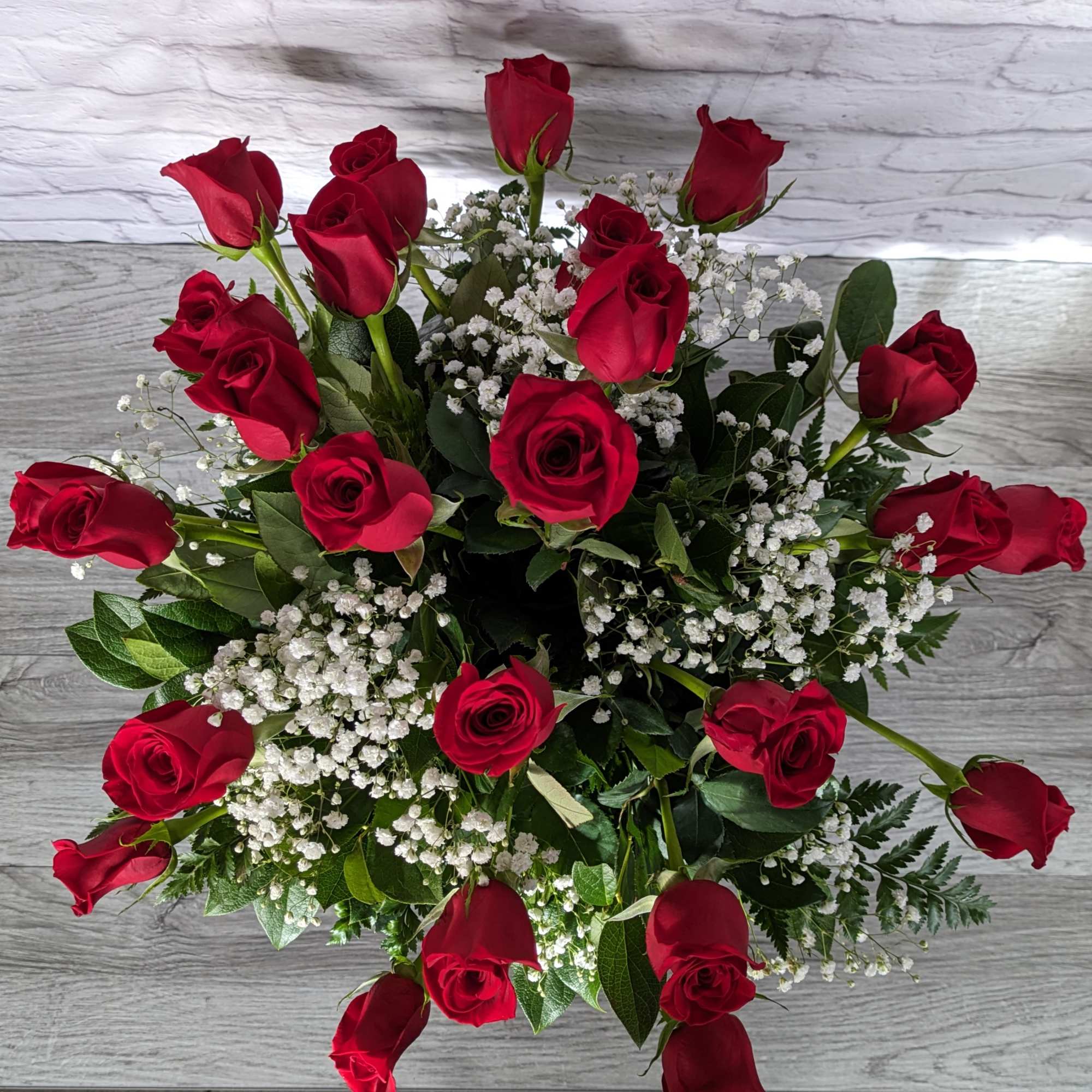 Bouquet of red roses with white baby's breath
