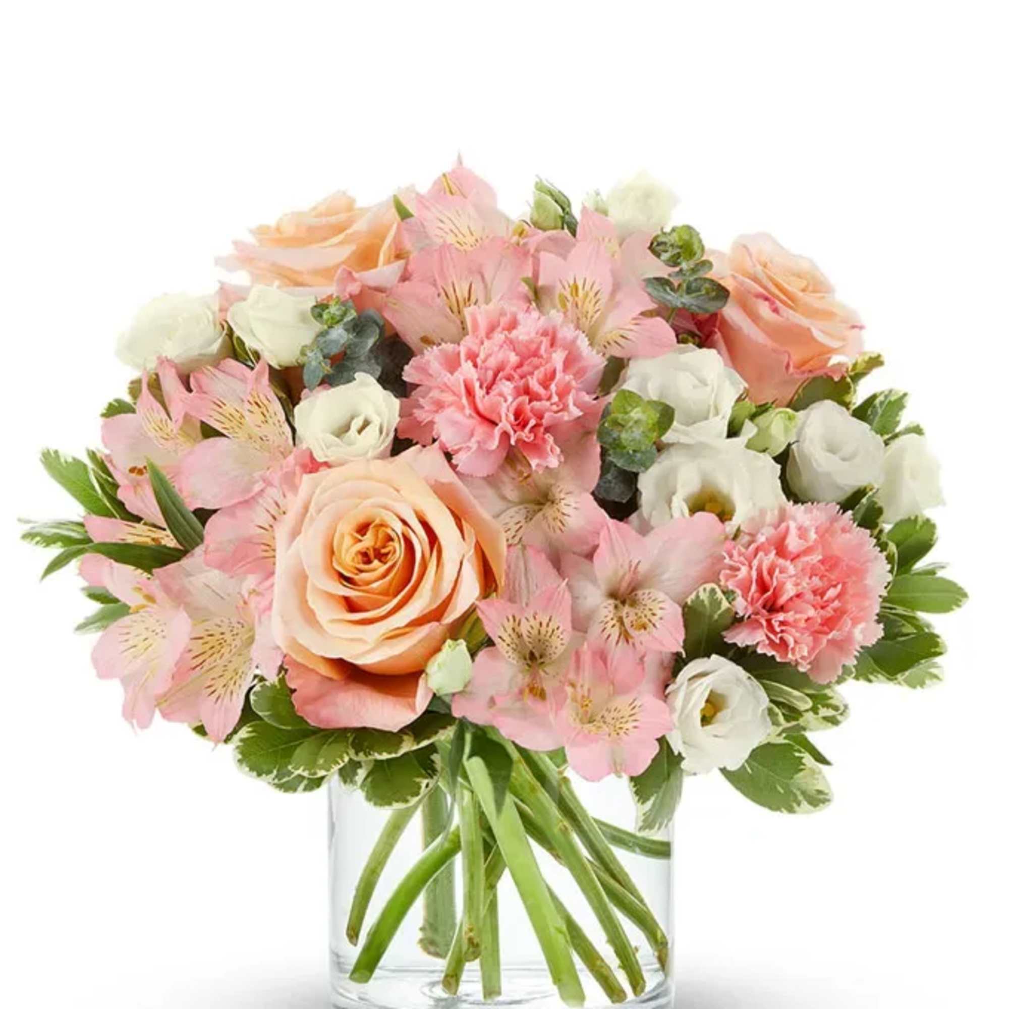 Pink and peach bouquet in a clear glass vase
